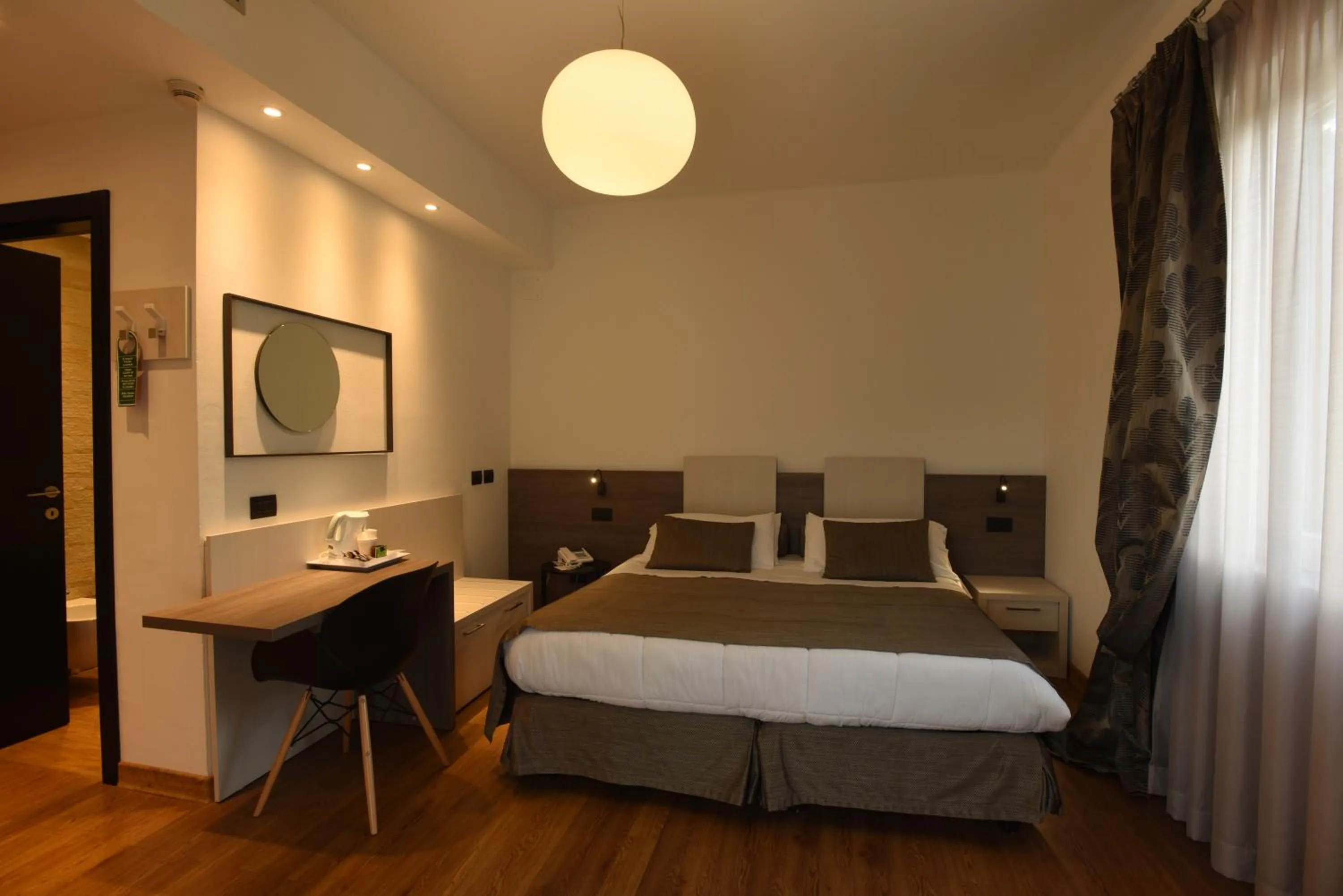 Bedroom in Hotel La Vigna