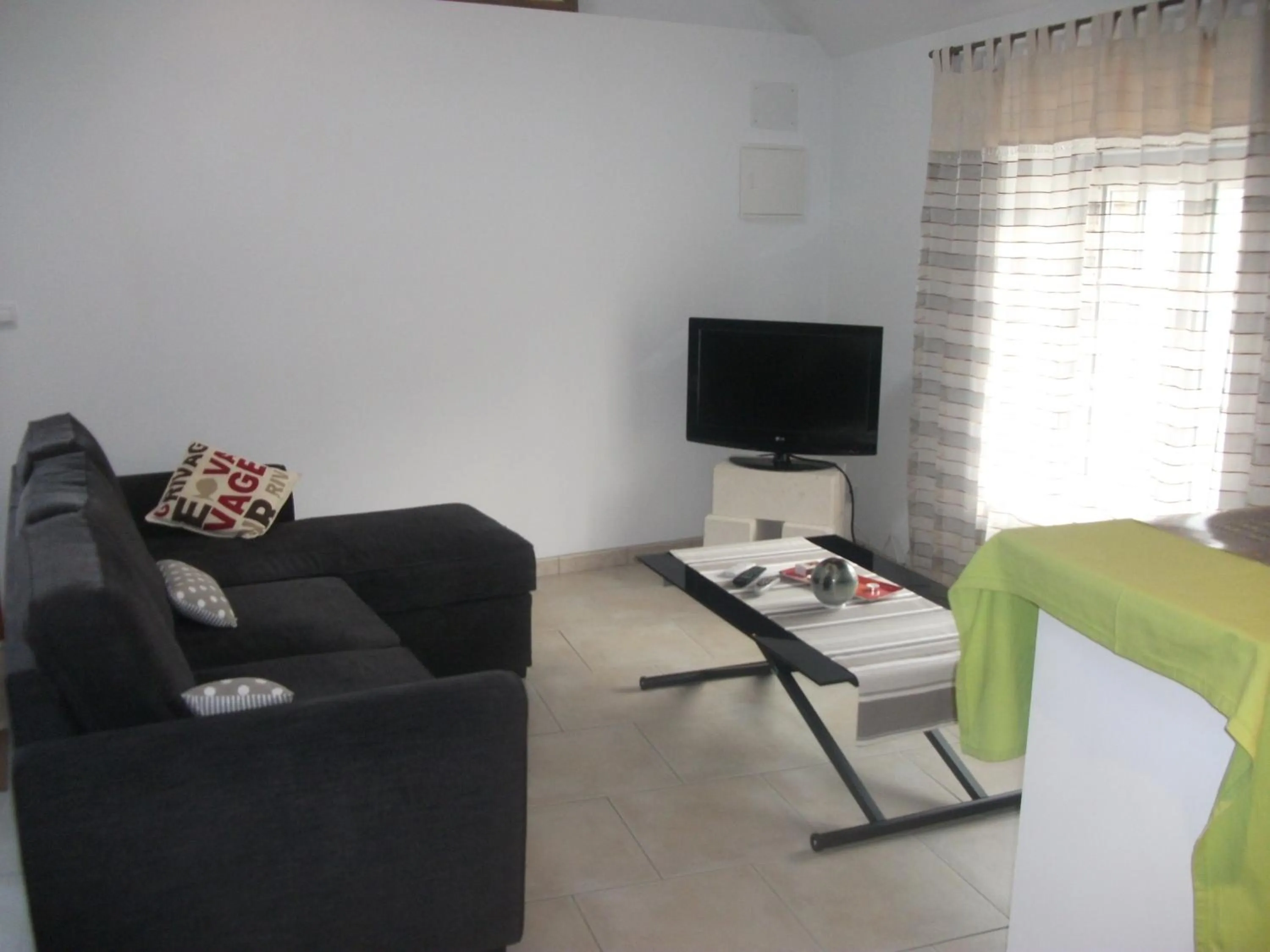 Communal lounge/ TV room in Le Moulin De Laval