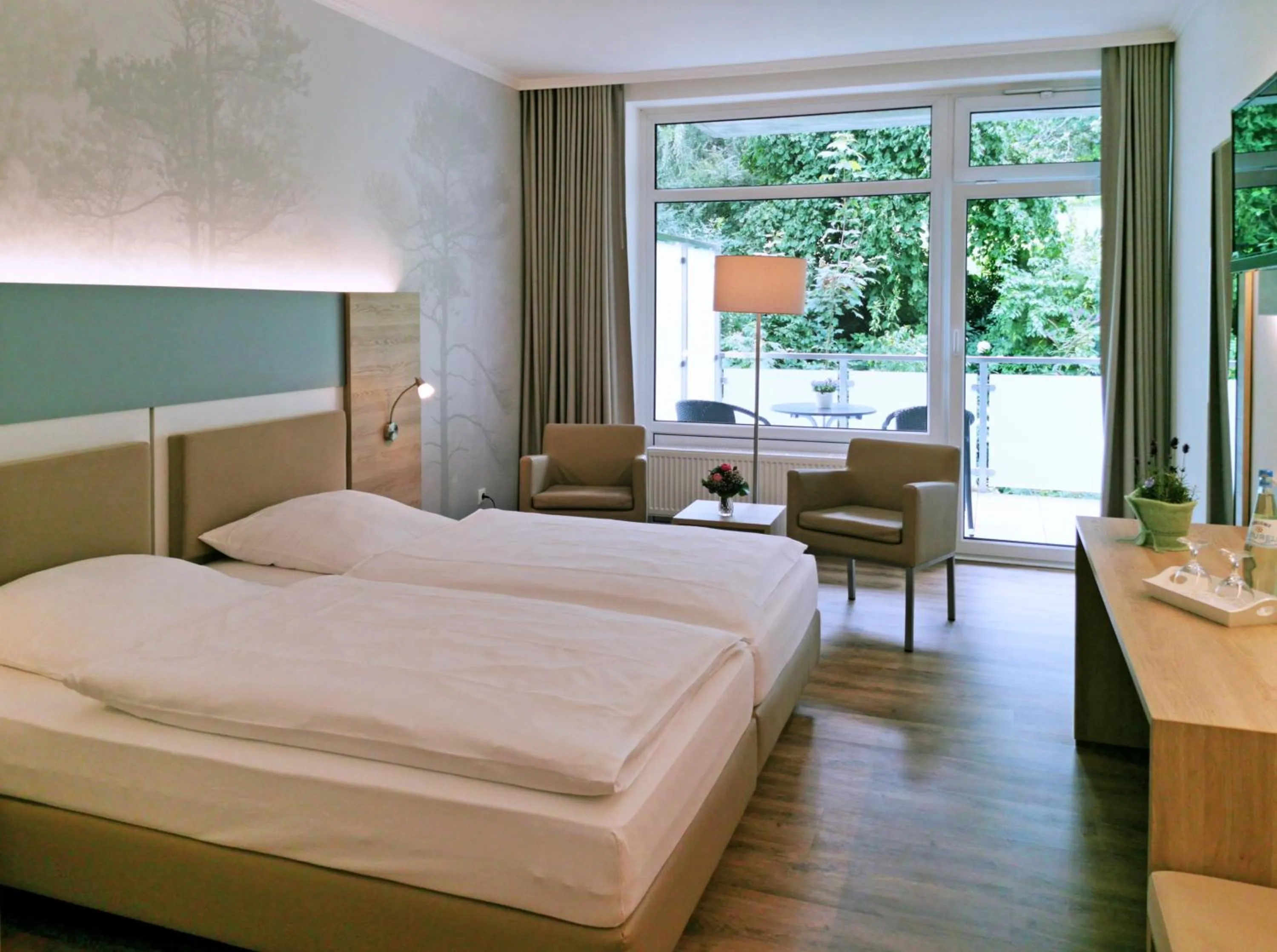 Photo of the whole room, Bed in Waldhotel Felsenkeller
