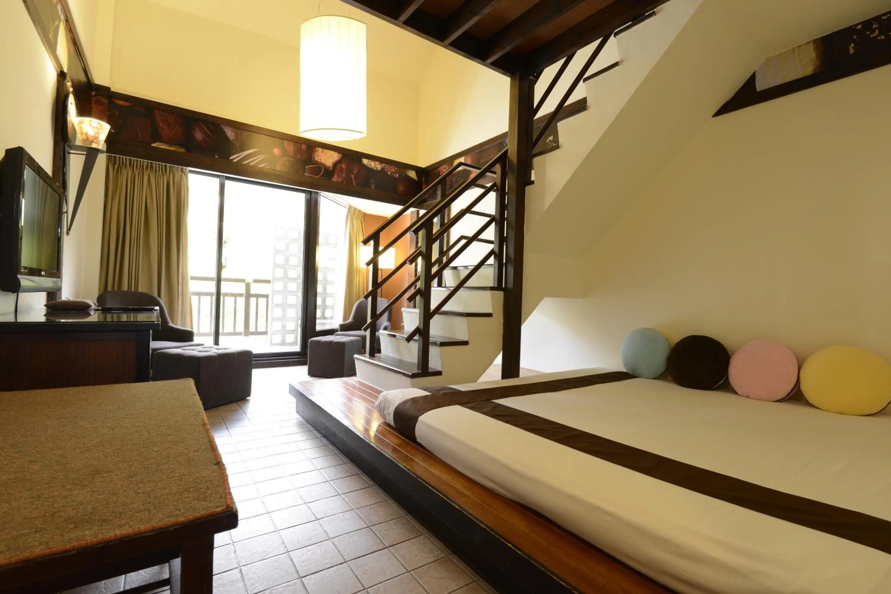 Photo of the whole room, Bed in Yoho Beach Resort Kenting