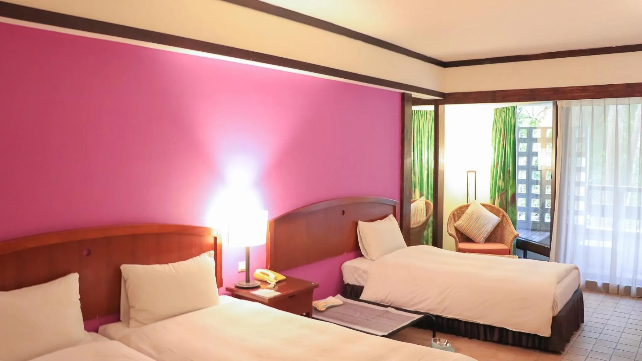 Photo of the whole room, Bed in Yoho Beach Resort Kenting