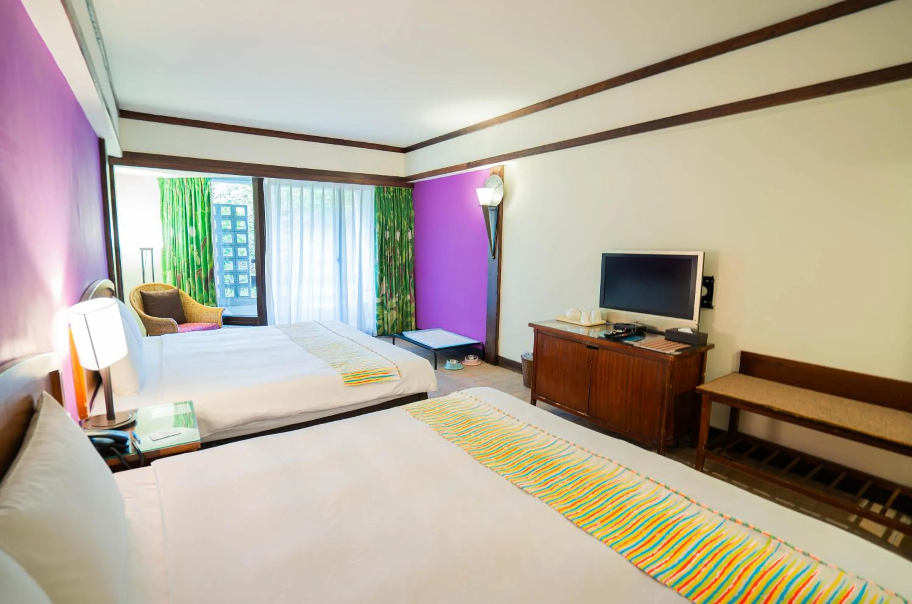 Photo of the whole room, Bed in Yoho Beach Resort Kenting