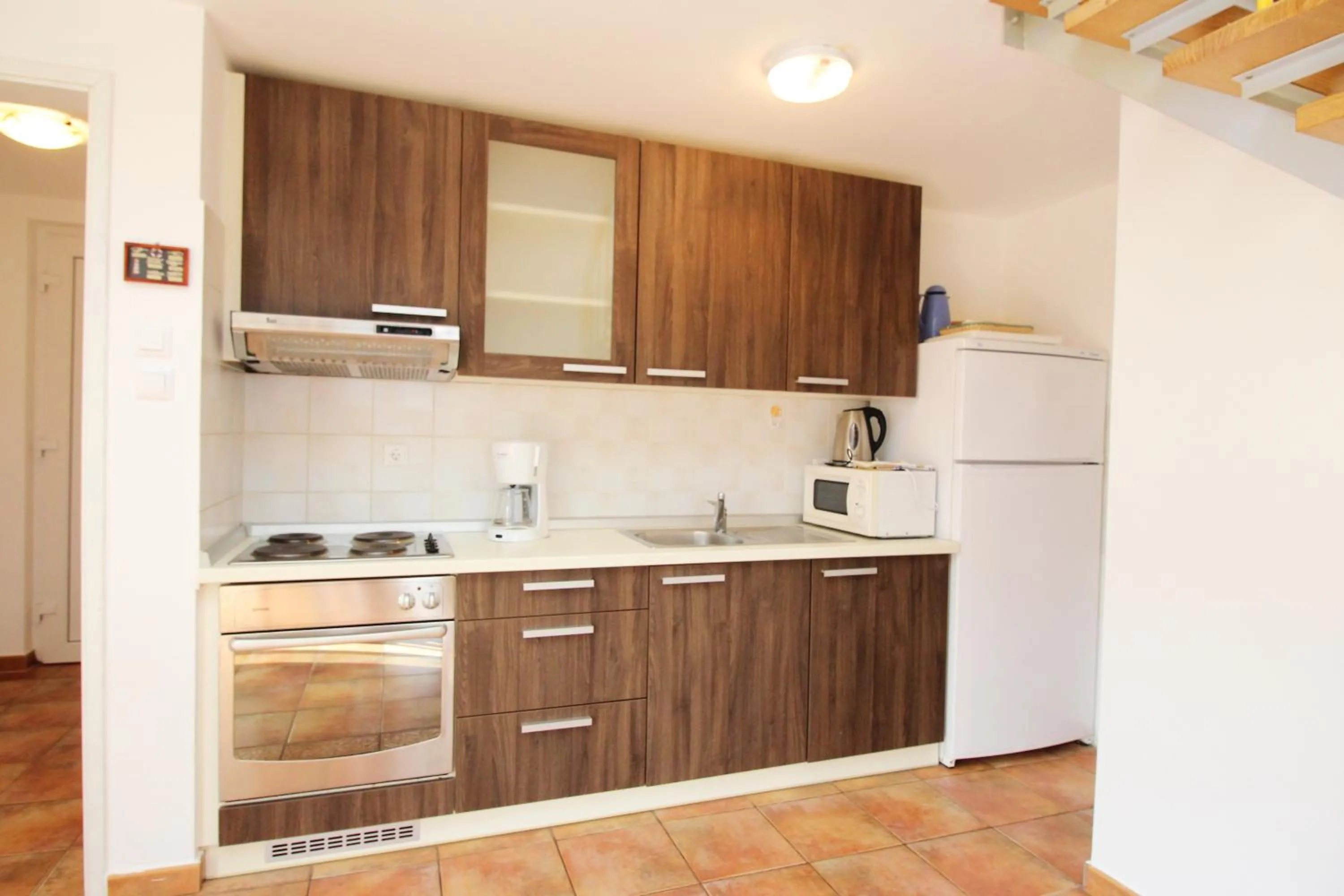 Kitchen or kitchenette in Apartment Pintar Beach