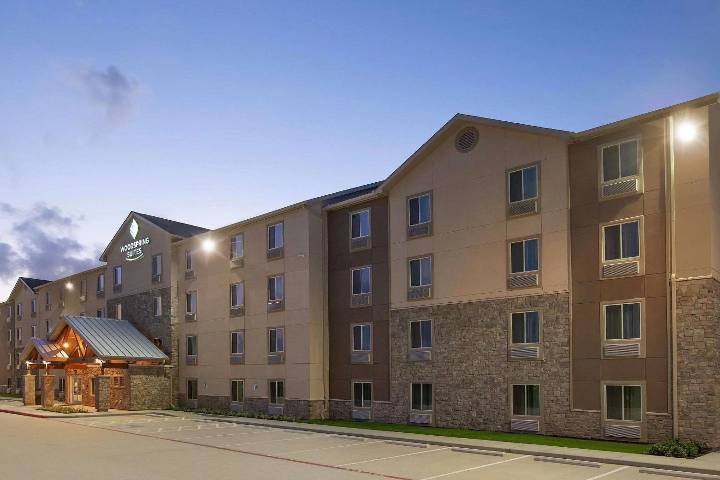 Property building in WoodSpring Suites Houston 288 South Medical Center