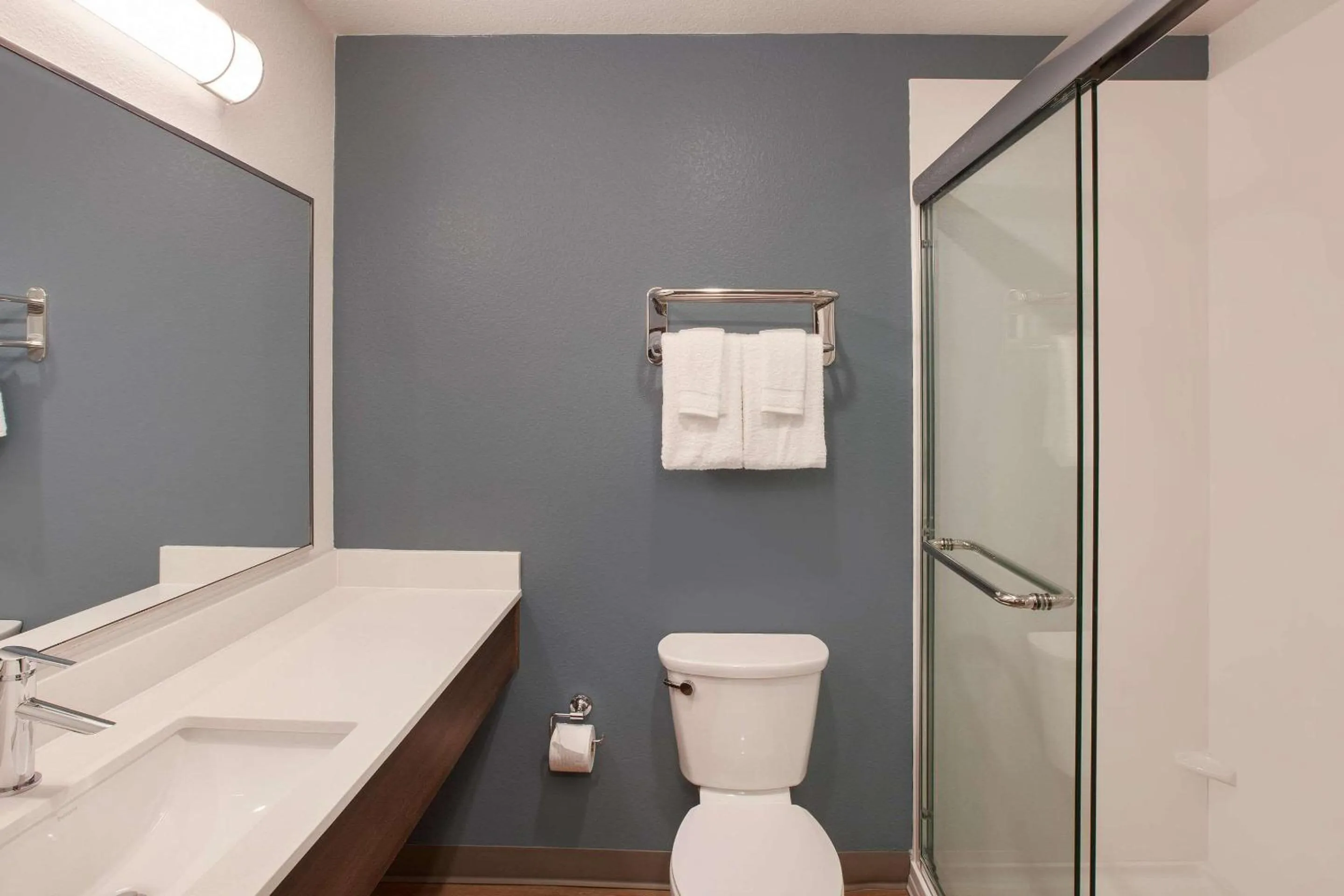 Bathroom in WoodSpring Suites Houston 288 South Medical Center