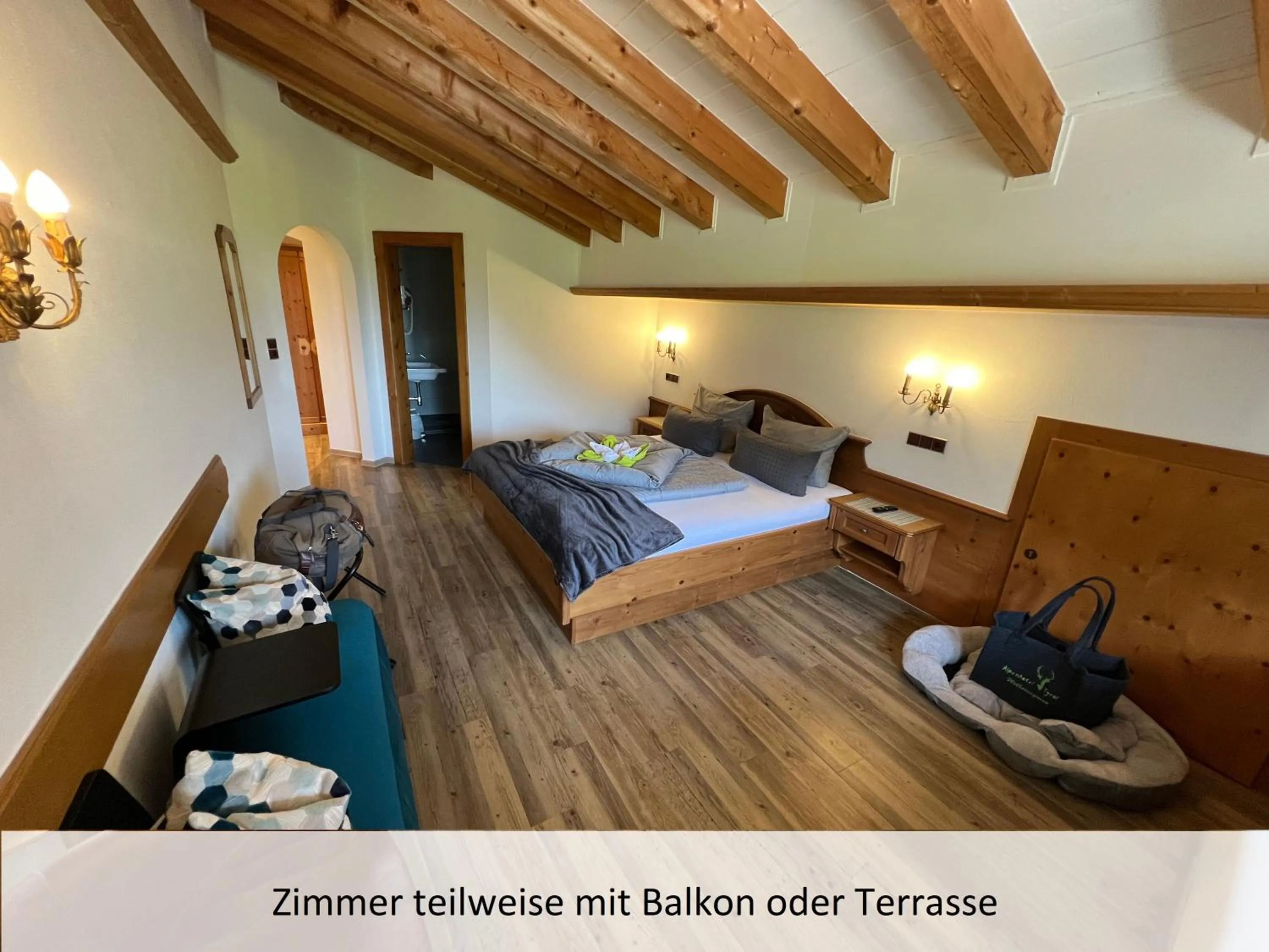 Photo of the whole room, Bed in ALPENHOTEL TYROL - B&B - ADULTS ONLY - Alpines Lifestylehotel - BIO & Nachhaltig