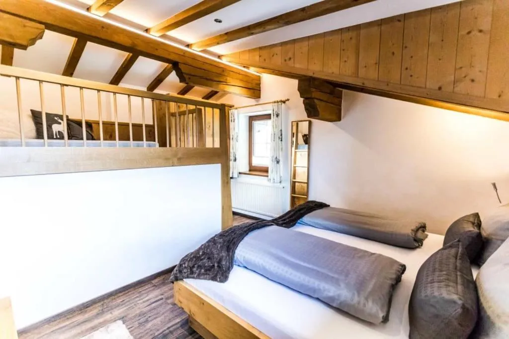 Bed in ALPENHOTEL TYROL - B&B - ADULTS ONLY - Alpines Lifestylehotel - BIO & Nachhaltig