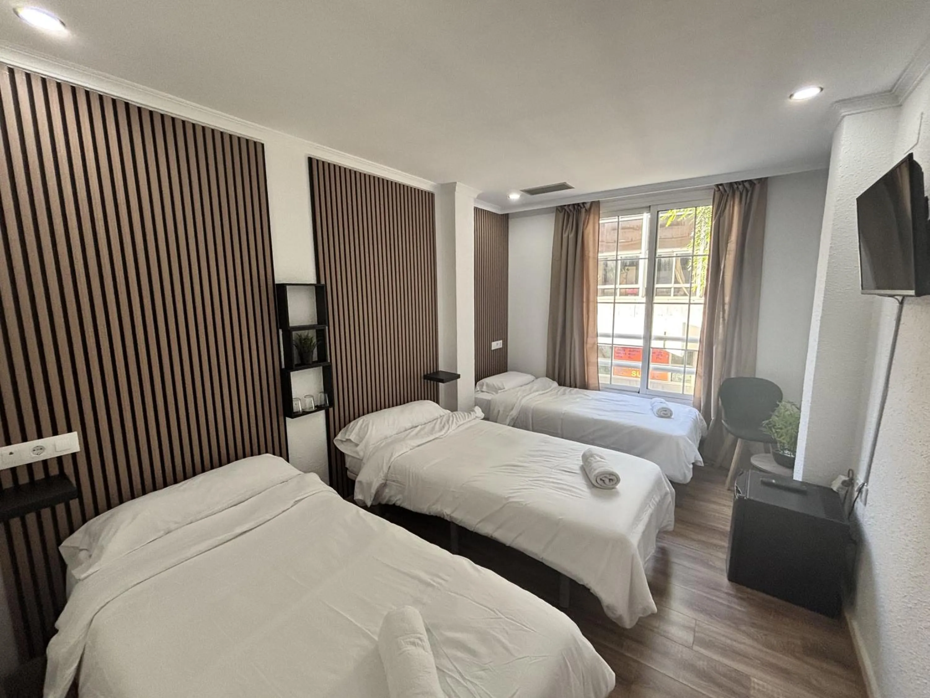 Bed in Hotel New Sanz