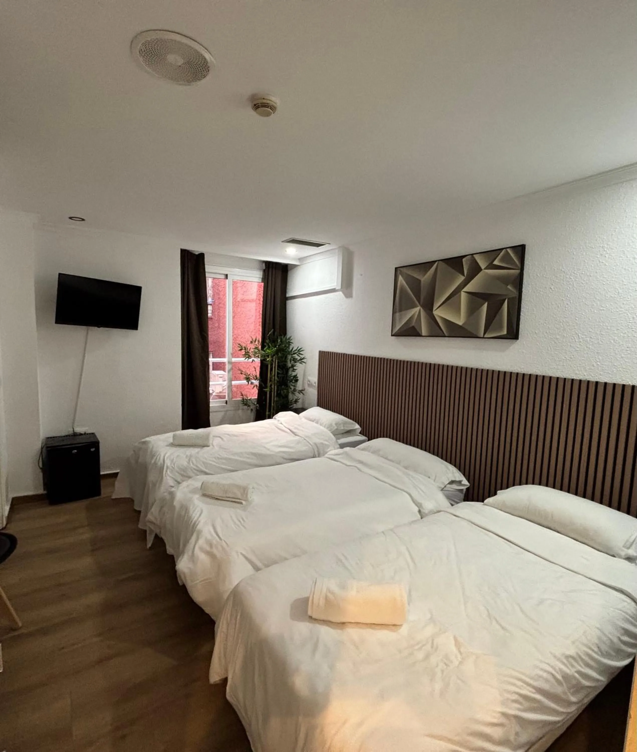 Bed in Hotel New Sanz