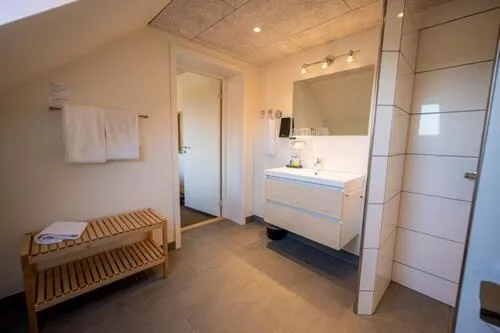 Bathroom, Bed in Nymindegab Kro