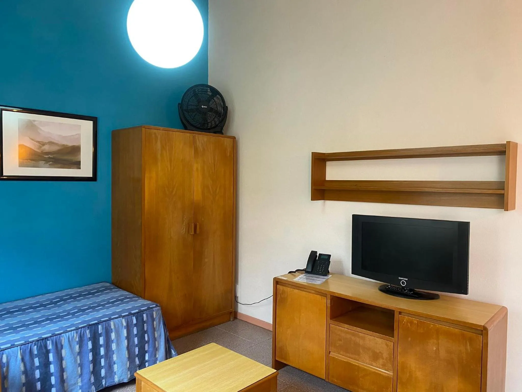 Living room, Bed in Hospedaria Verdemar