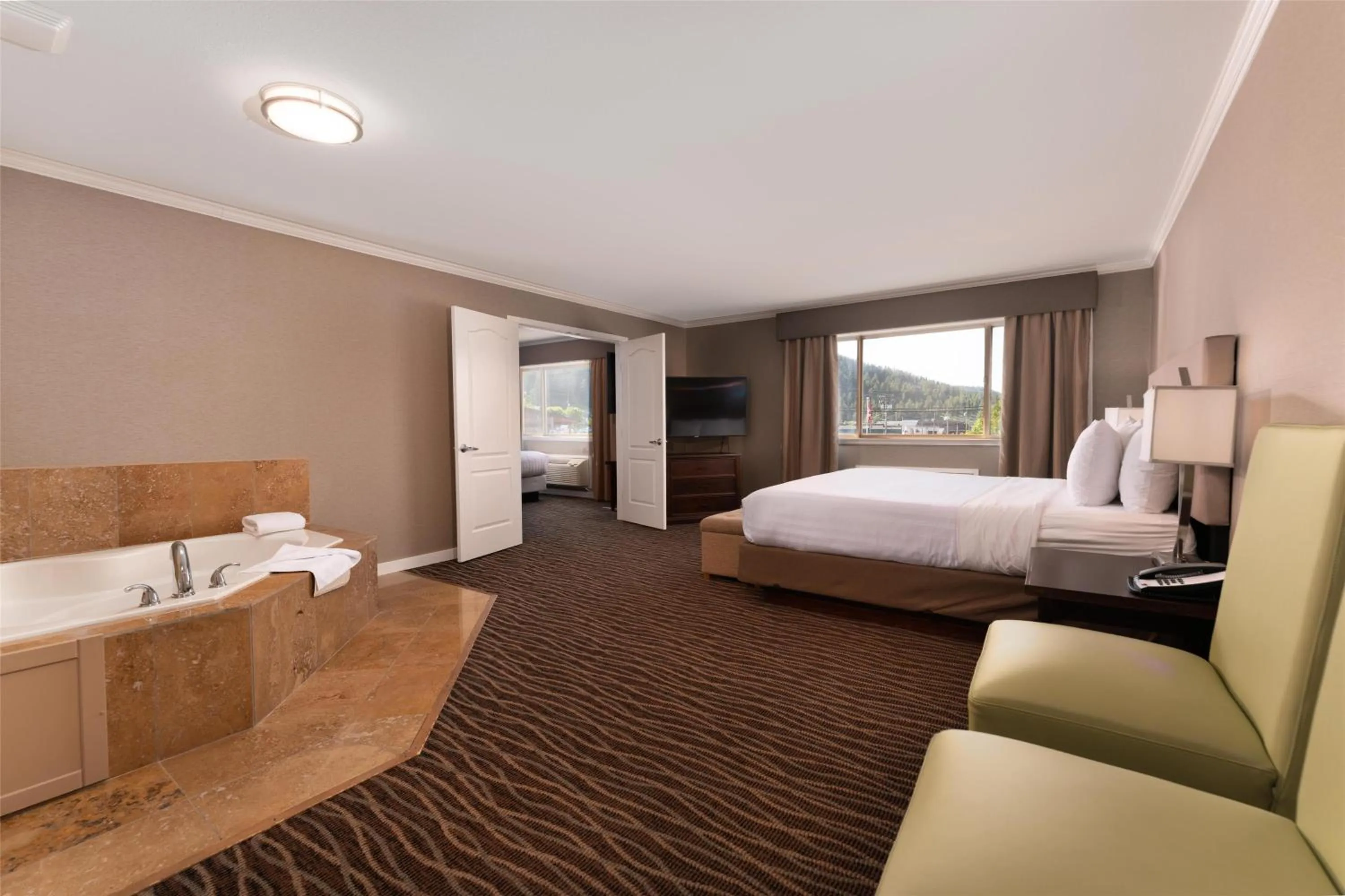 Bedroom, Bed in Prestige Radium Hot Springs Resort, WorldHotels Crafted