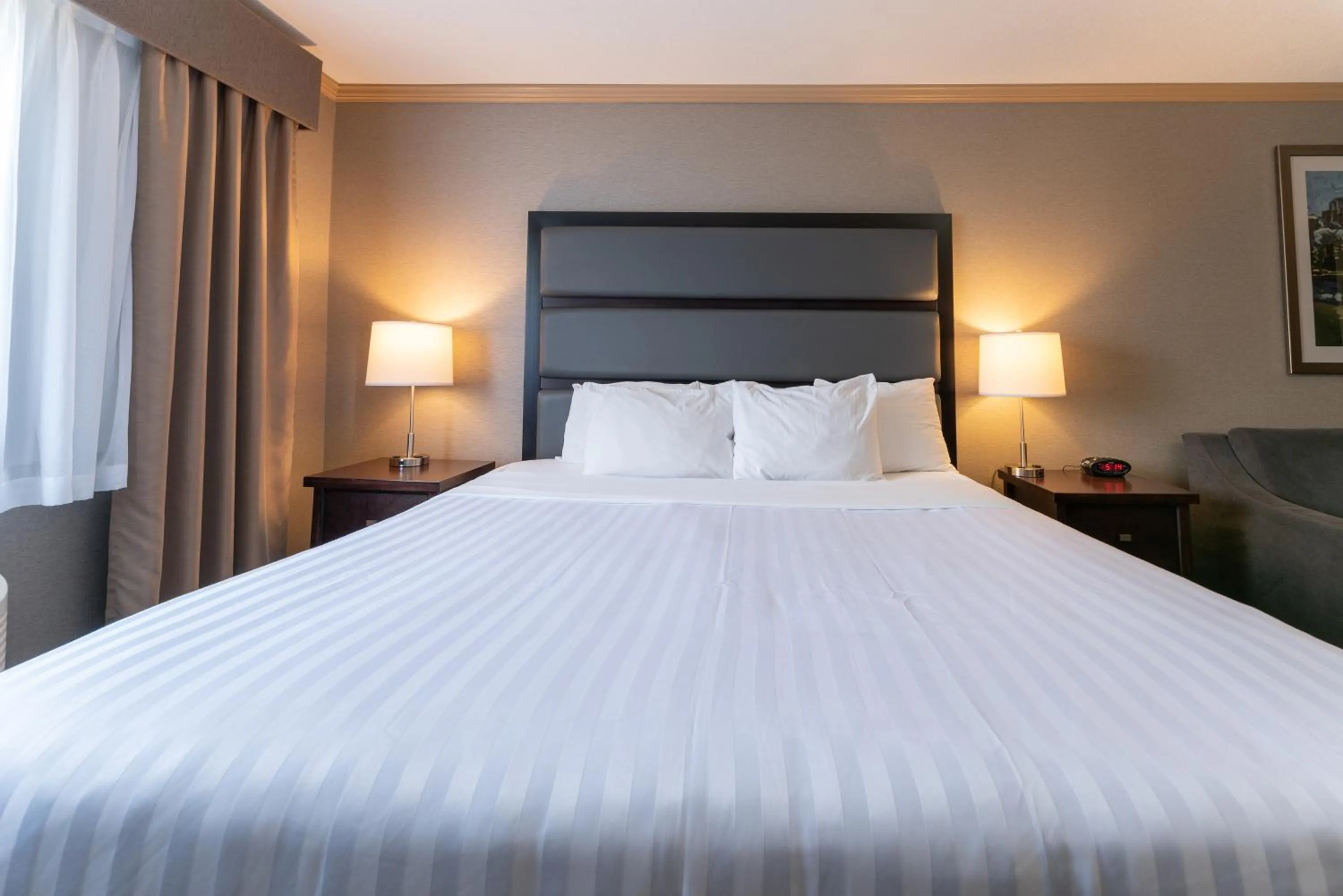 Bed in Prestige Radium Hot Springs Resort, WorldHotels Crafted