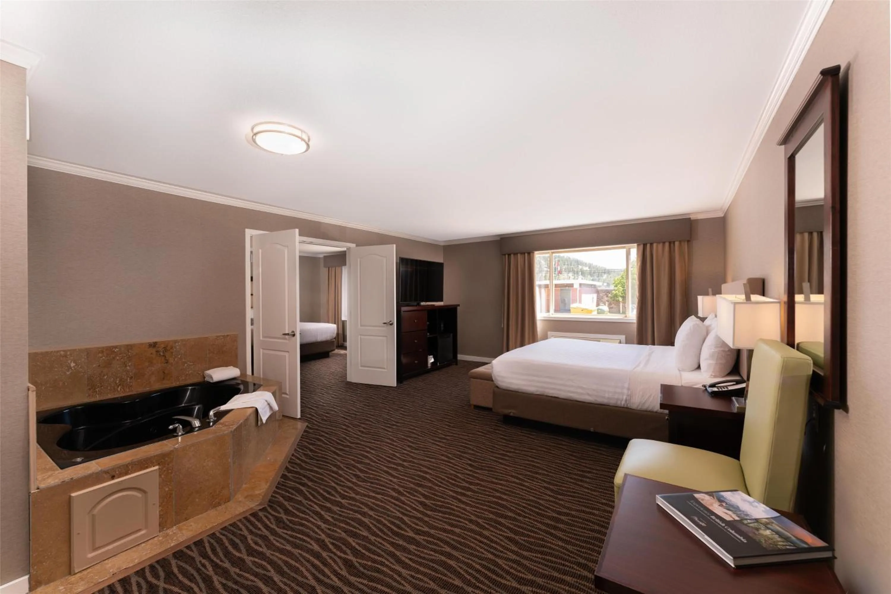 Bedroom, Bed in Prestige Radium Hot Springs Resort, WorldHotels Crafted