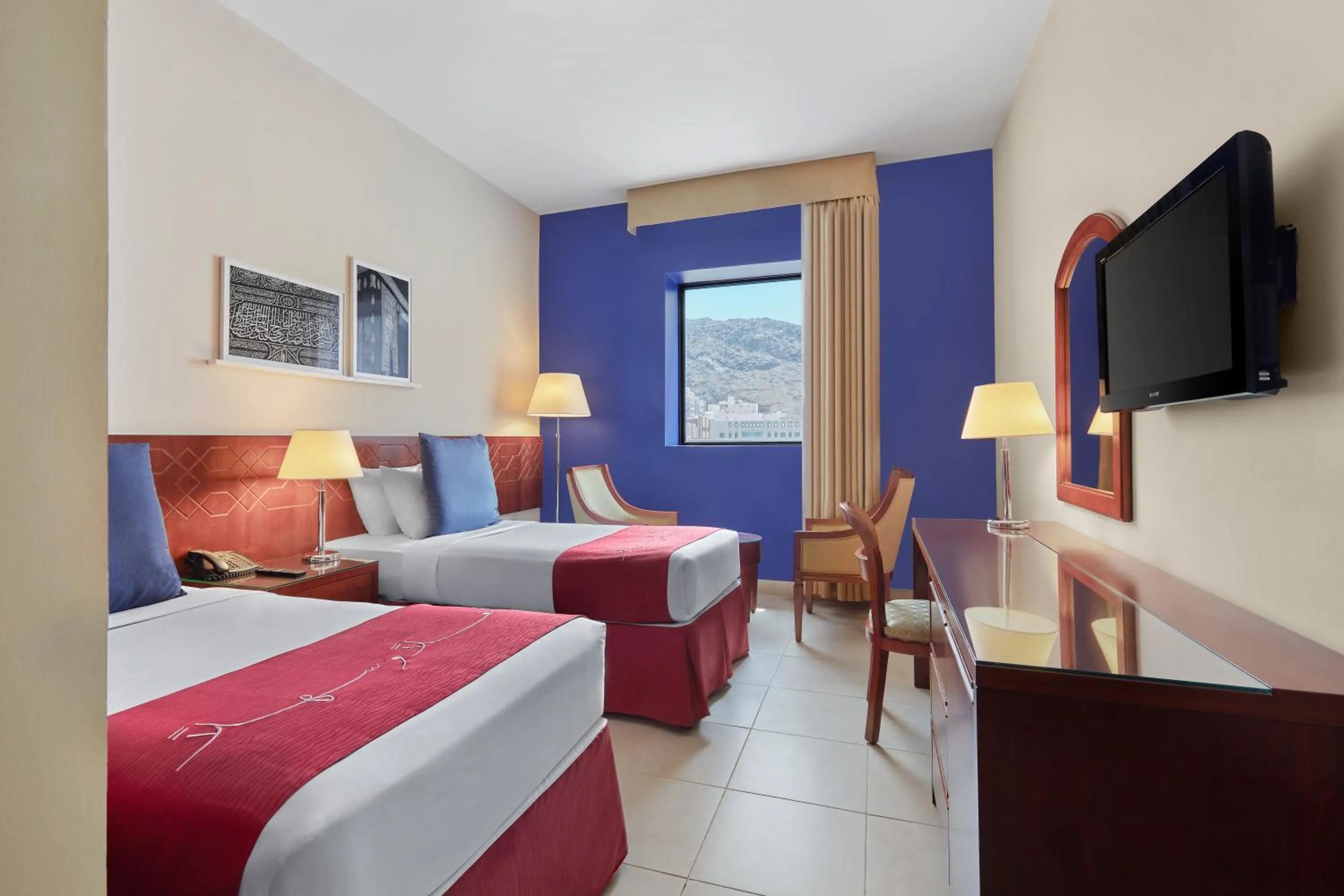 Photo of the whole room, Bed in Makarem Al Bait Al Azizia Hotel