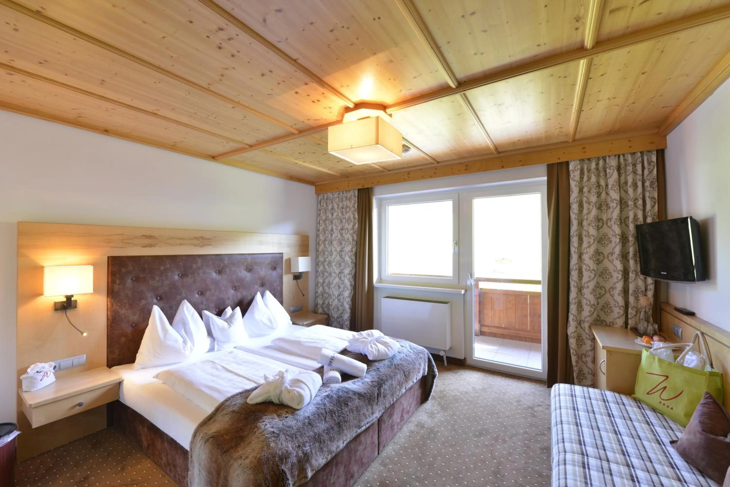 Bed in Hotel Der Wastlhof - direkt an der Skipiste Wellness & Spa
