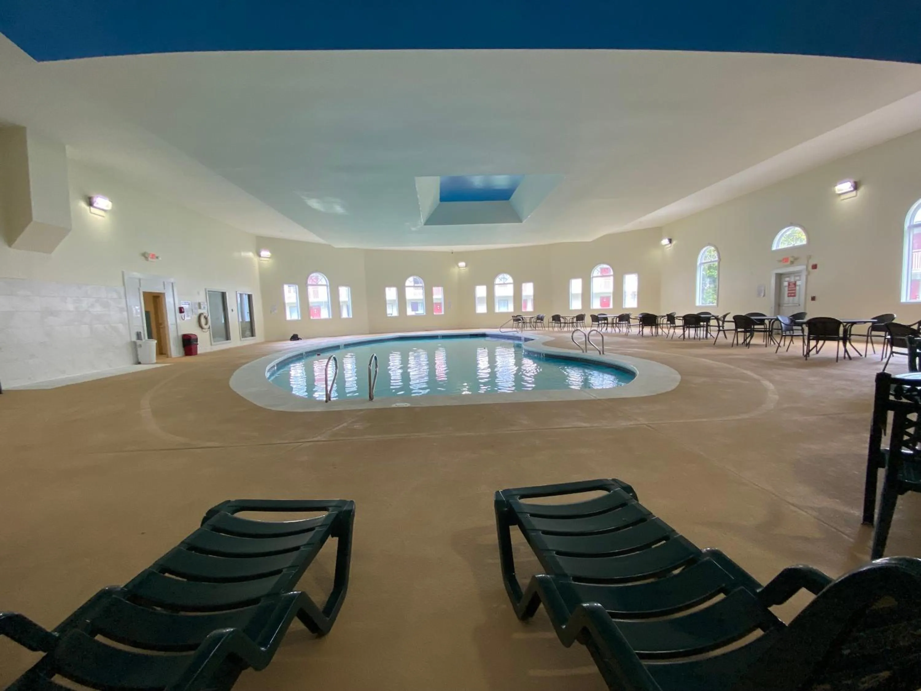 Swimming pool in Whalers Inn and Suites