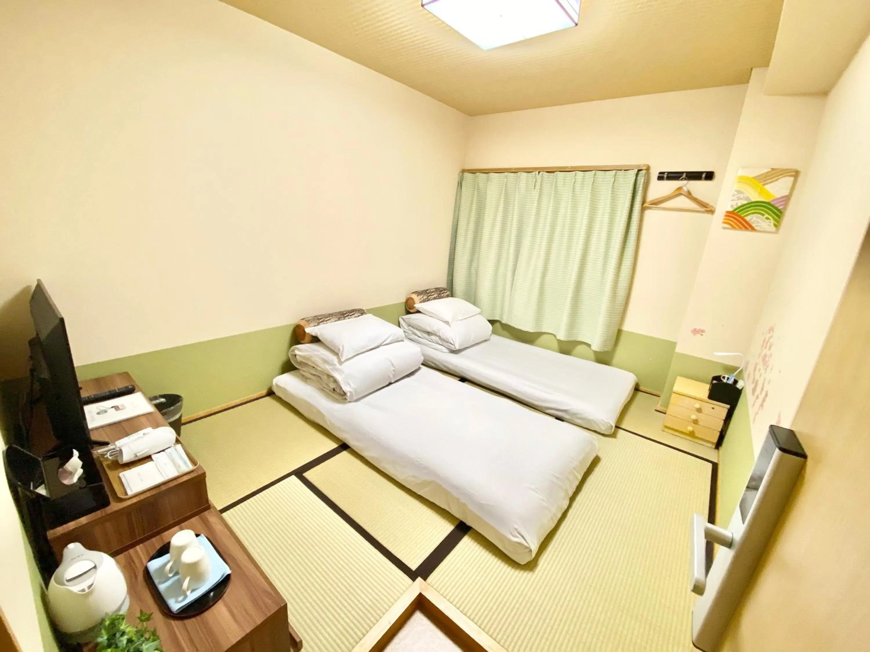 Photo of the whole room, Bed in GuestHouse017徳島個室 飲食街中心 阿波踊り会館7分 文理&徳島大学 アスティとくしま車8分