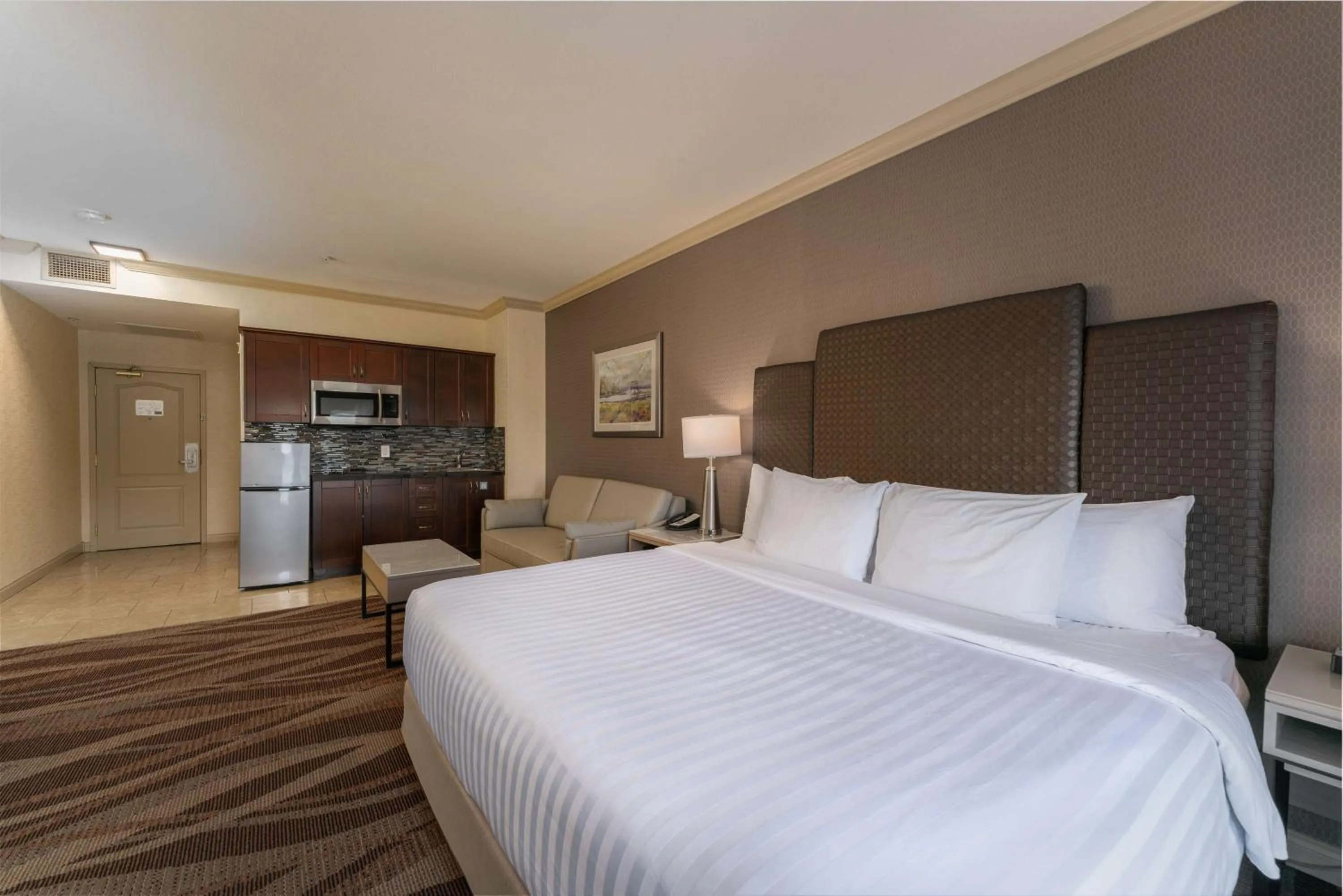 Photo of the whole room, Bed in Prestige Harbourfront Resort, WorldHotels Luxury