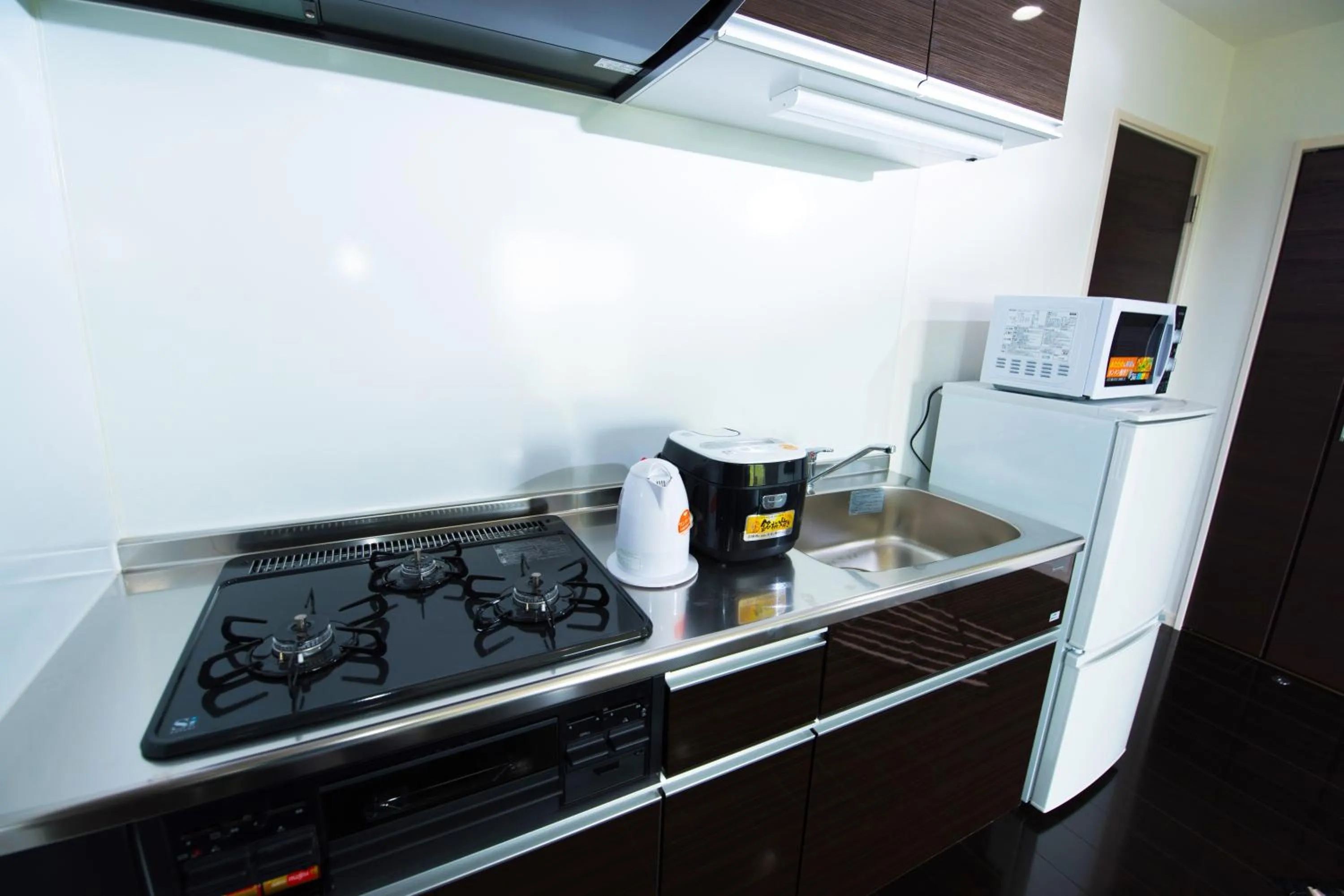 Kitchen or kitchenette in Kourijima L'hotels