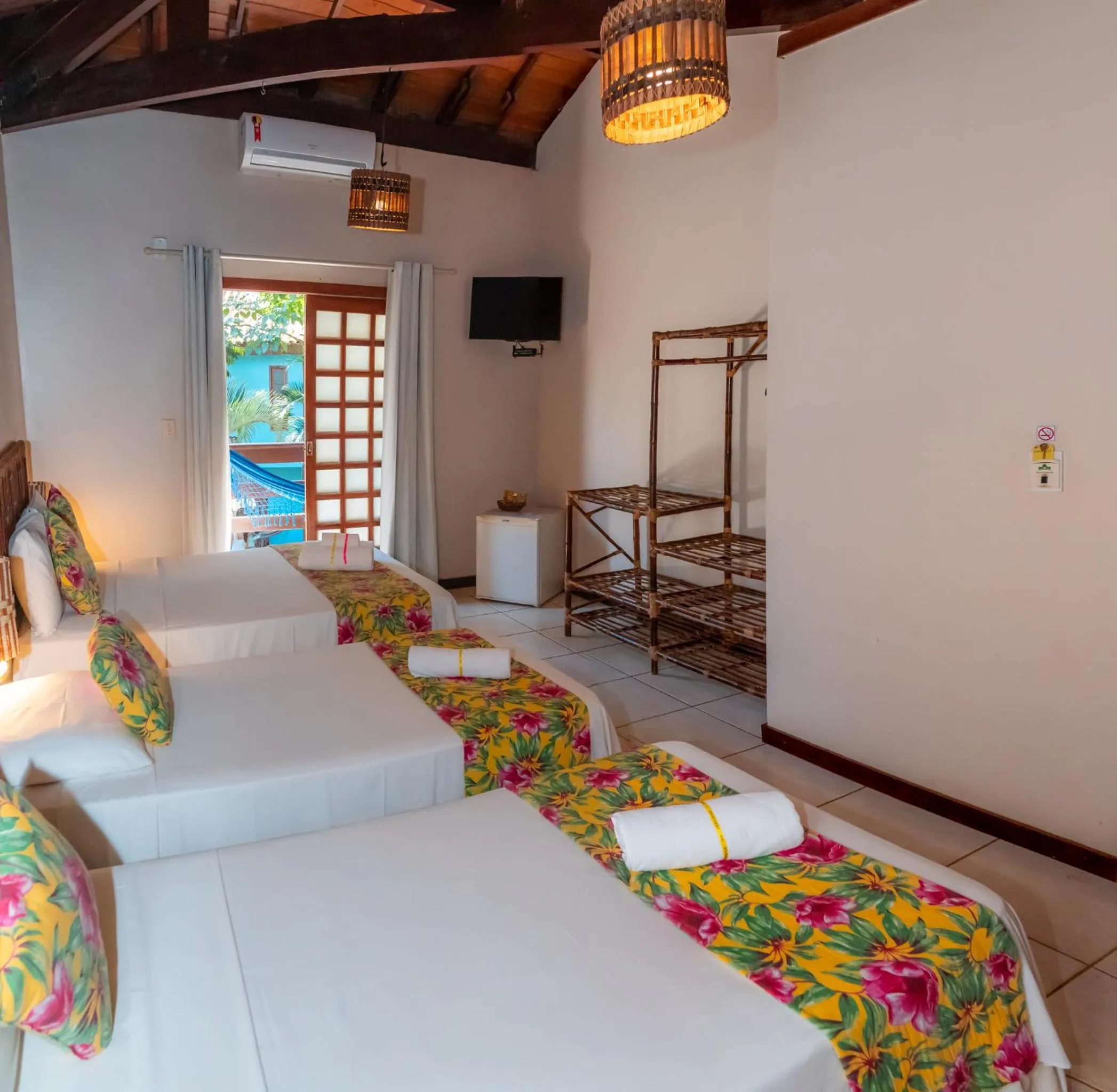 Photo of the whole room, Bed in Pousada Bambu