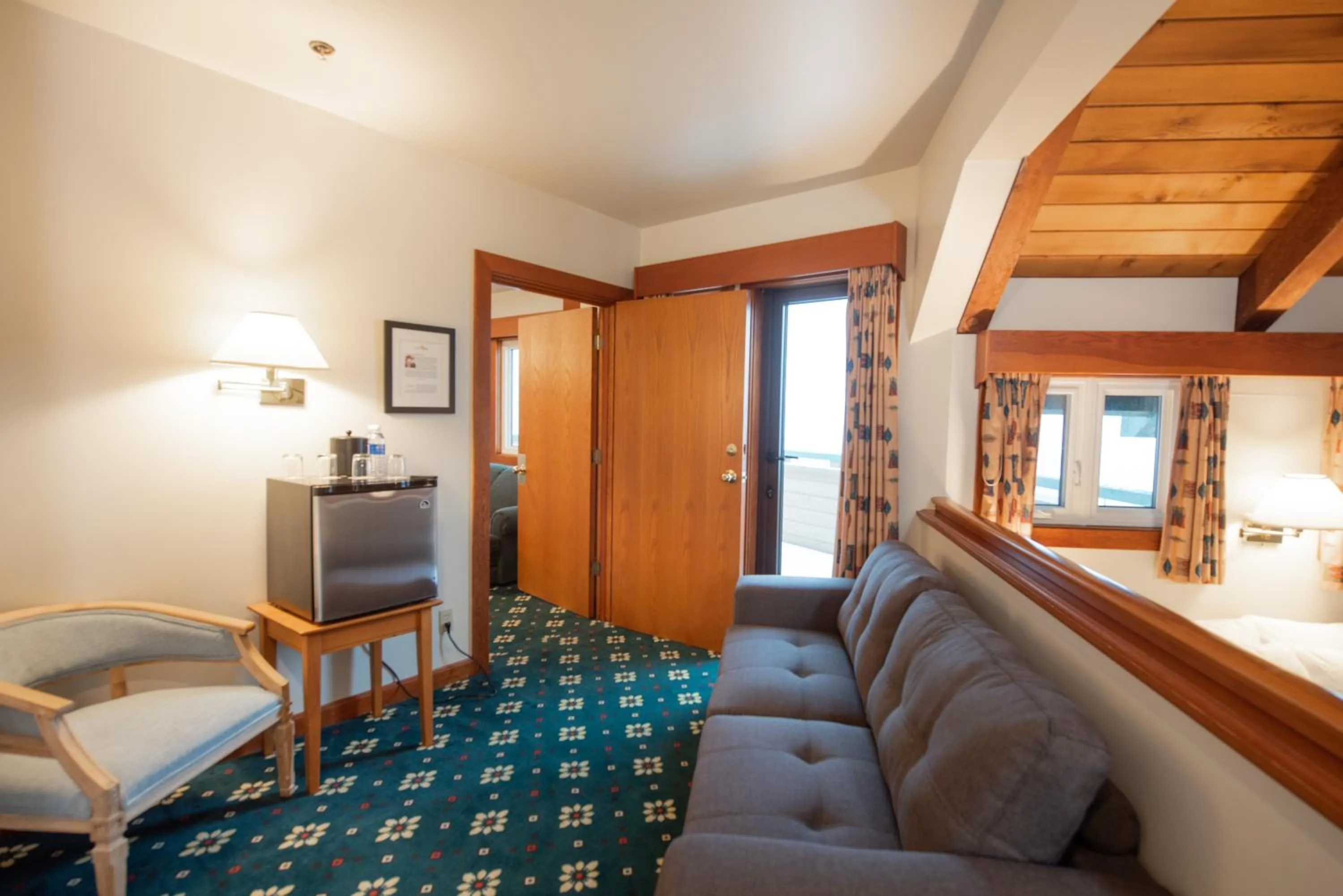 Seating area in Painter's Lodge, Trademark Collection by Wyndham