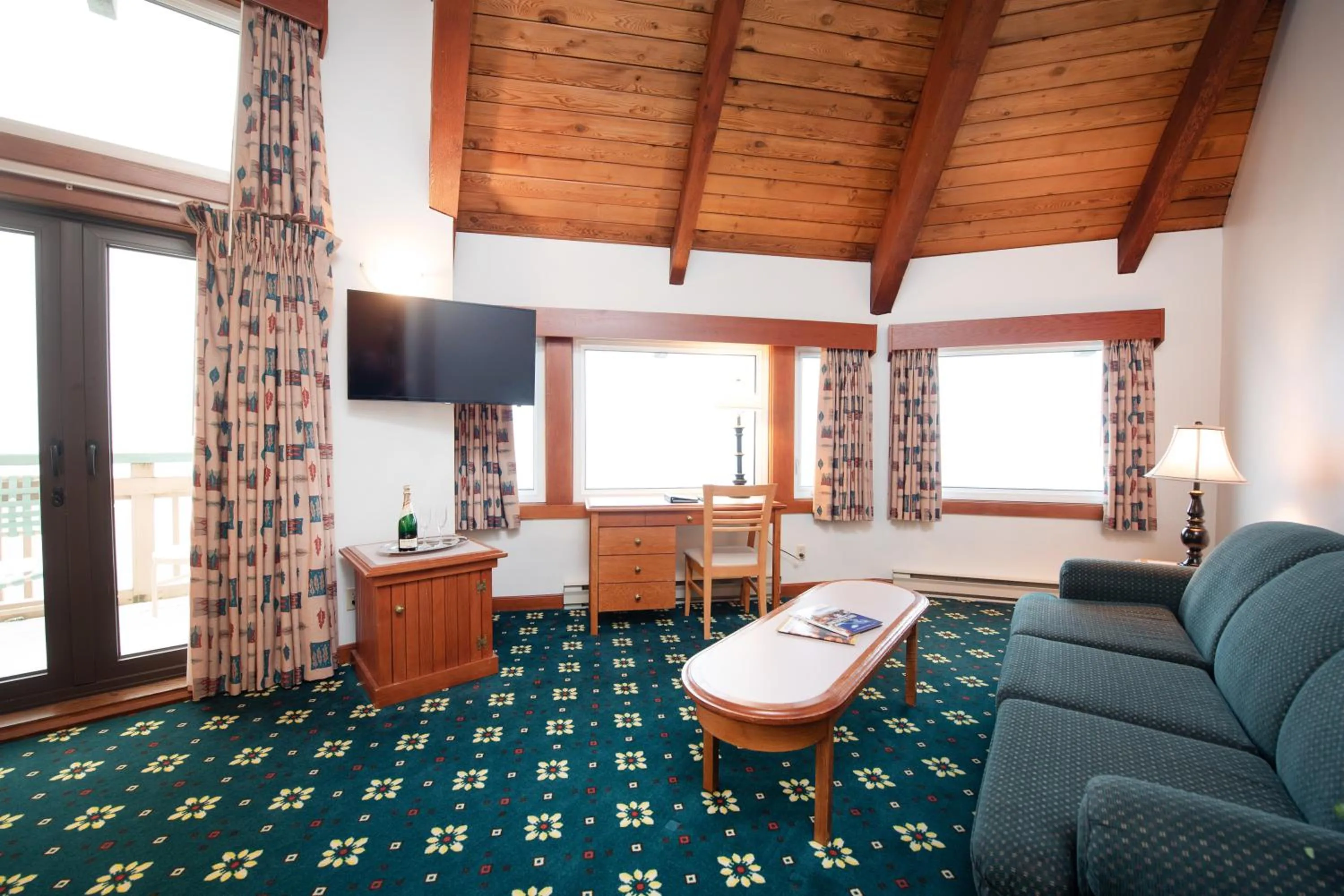 Living room in Painter's Lodge, Trademark Collection by Wyndham