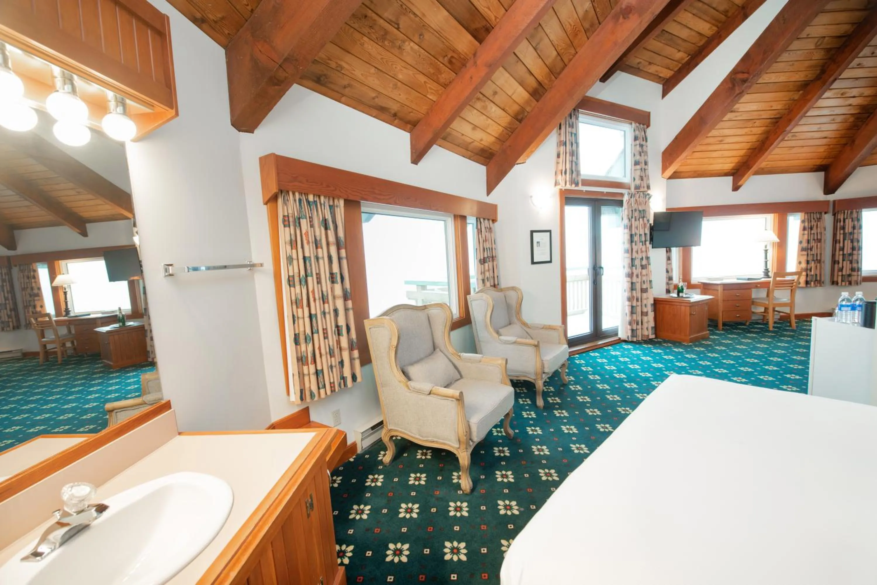 Seating area in Painter's Lodge, Trademark Collection by Wyndham