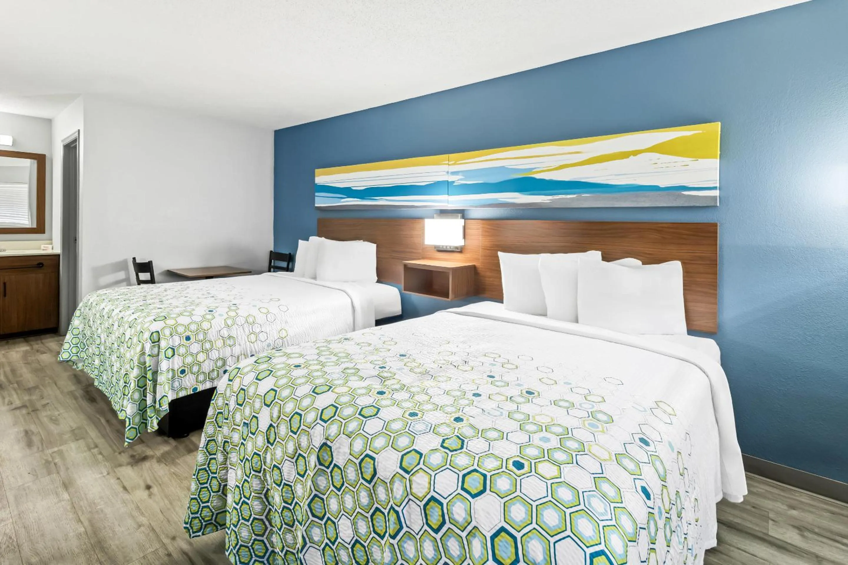 Photo of the whole room, Bed in HomeTowne Studios by Red Roof Florence, KY-Cincinnati Airport