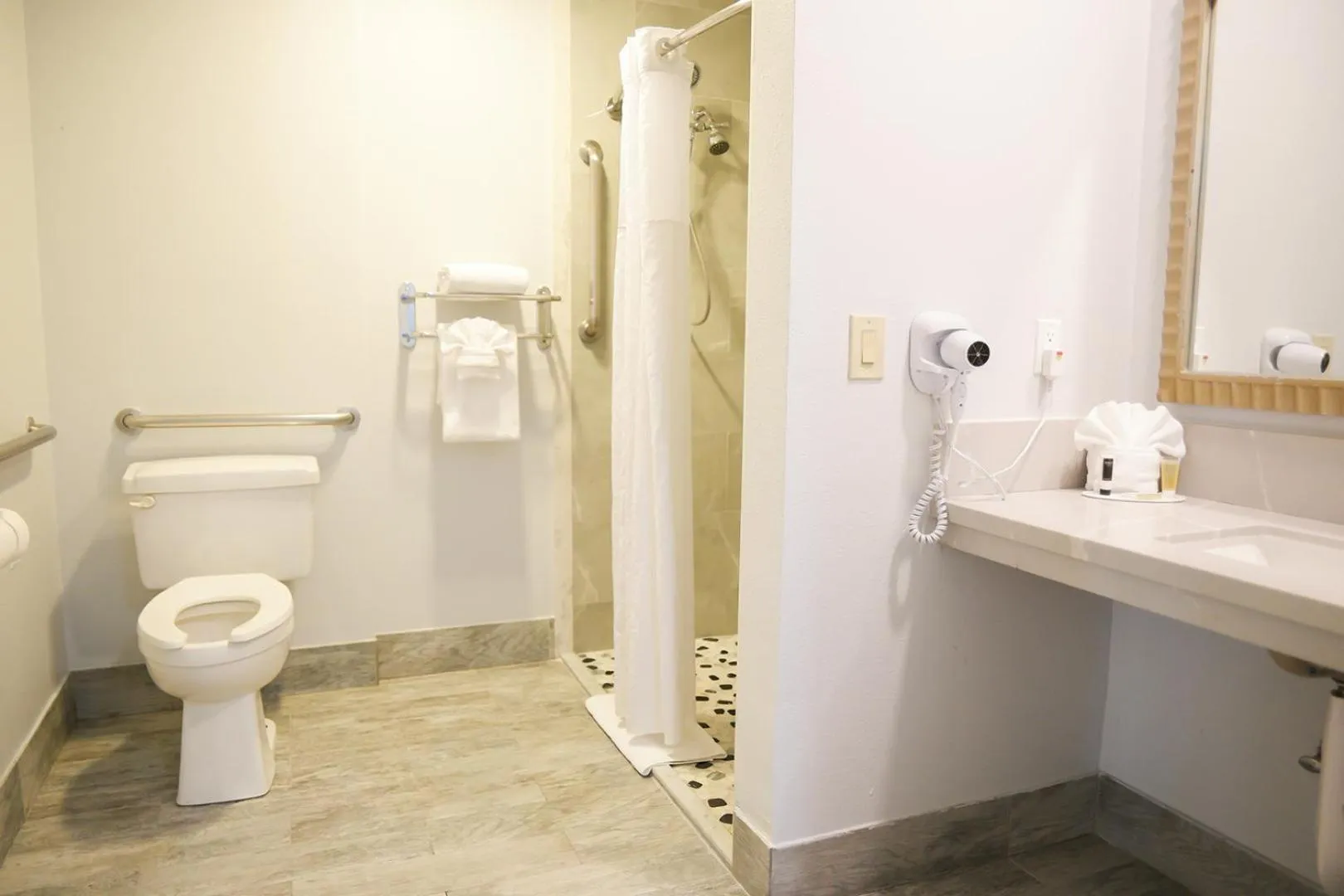 Toilet in Days Inn by Wyndham West Covina