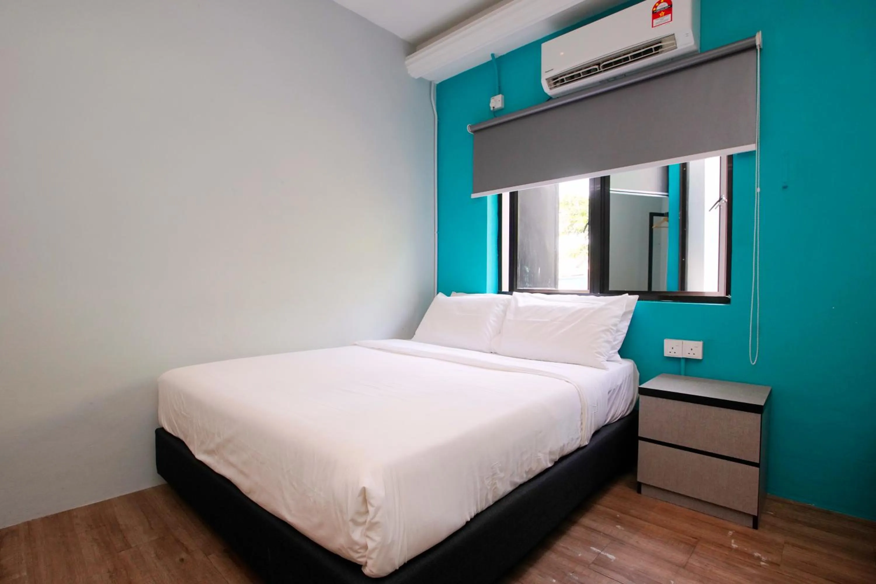 Bed in Ipoh Sakura Hotel