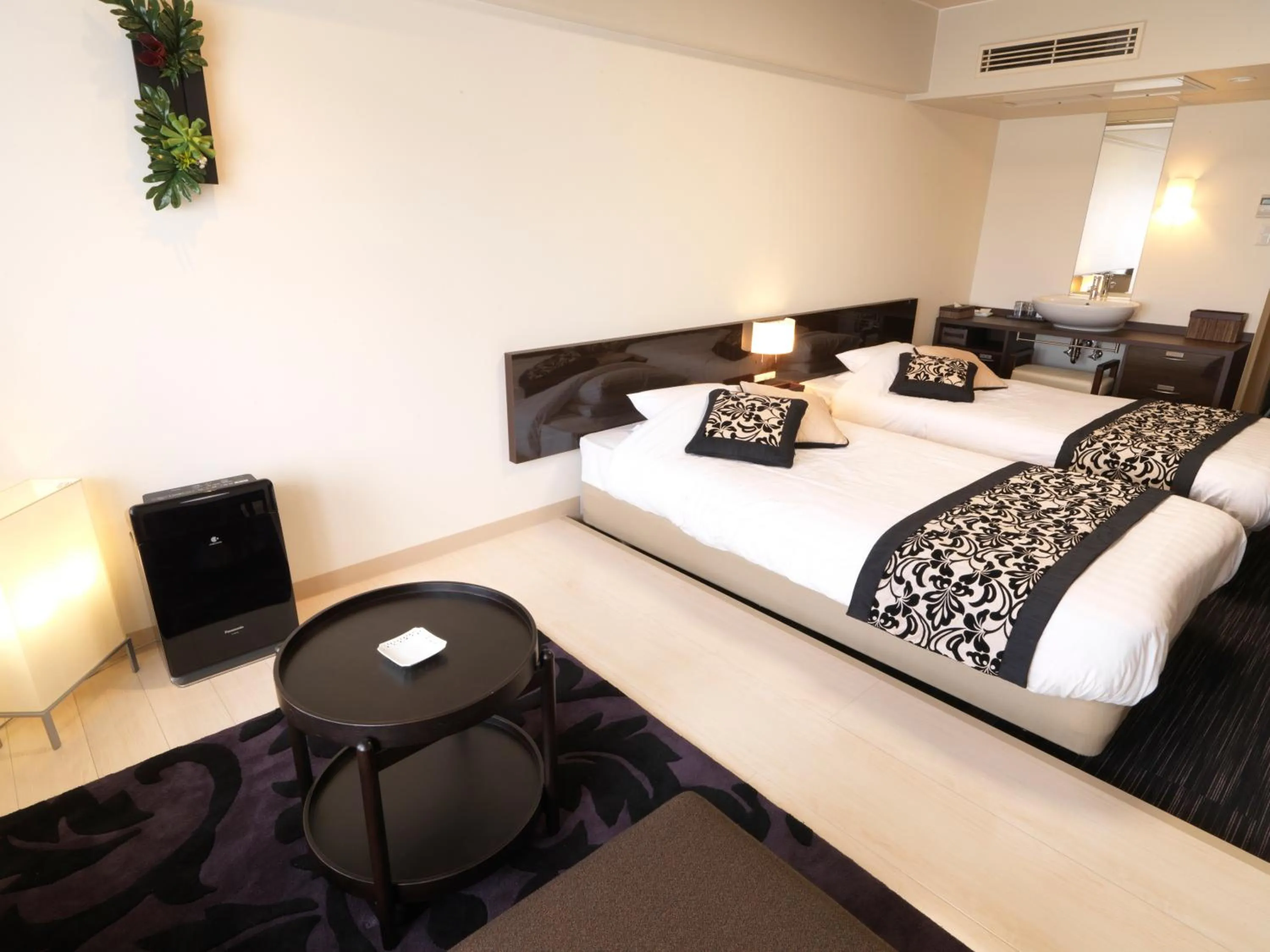 Bed in THE FOREST AKAN Tsuruga Resort