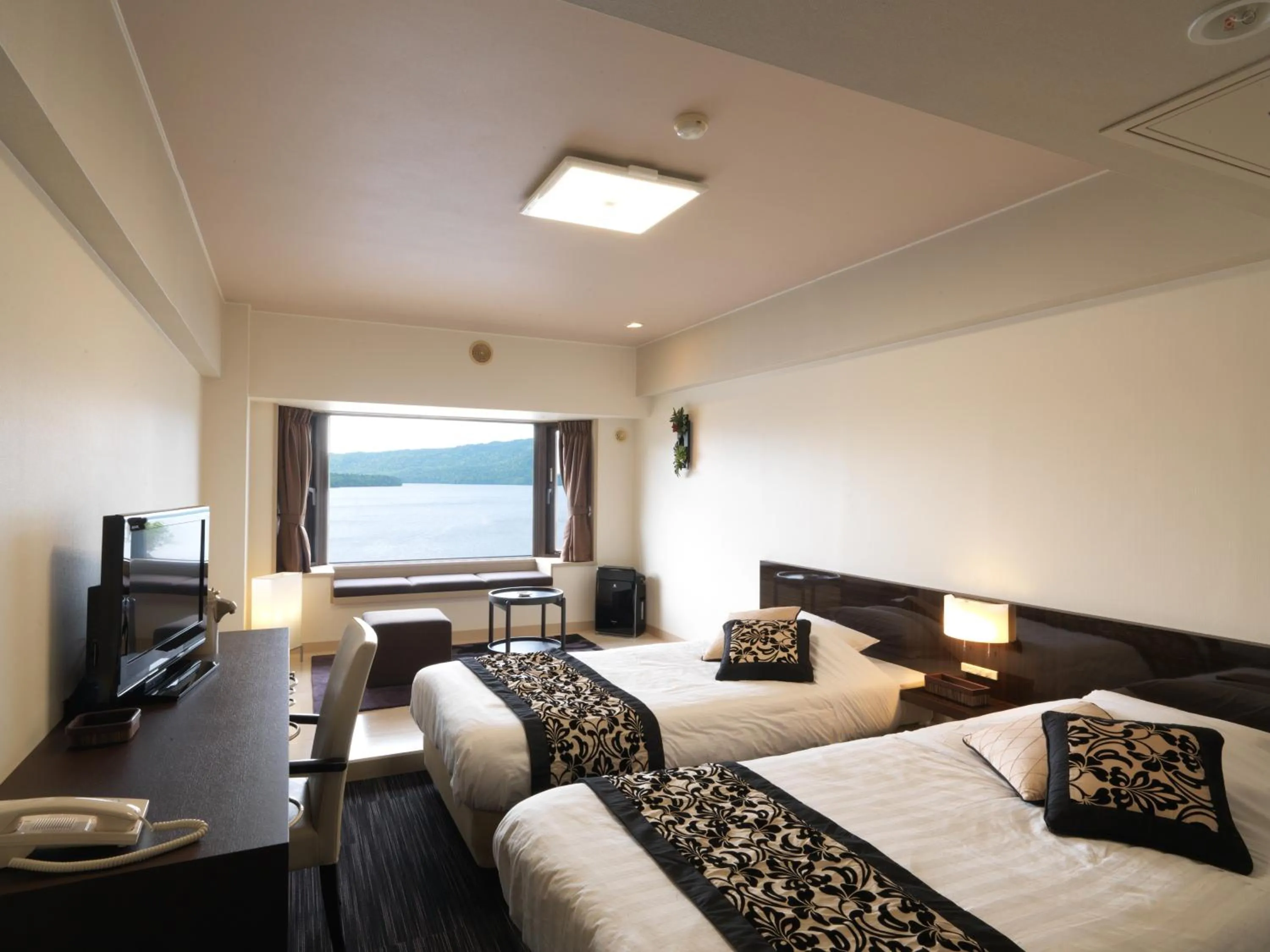 Photo of the whole room, Bed in THE FOREST AKAN Tsuruga Resort