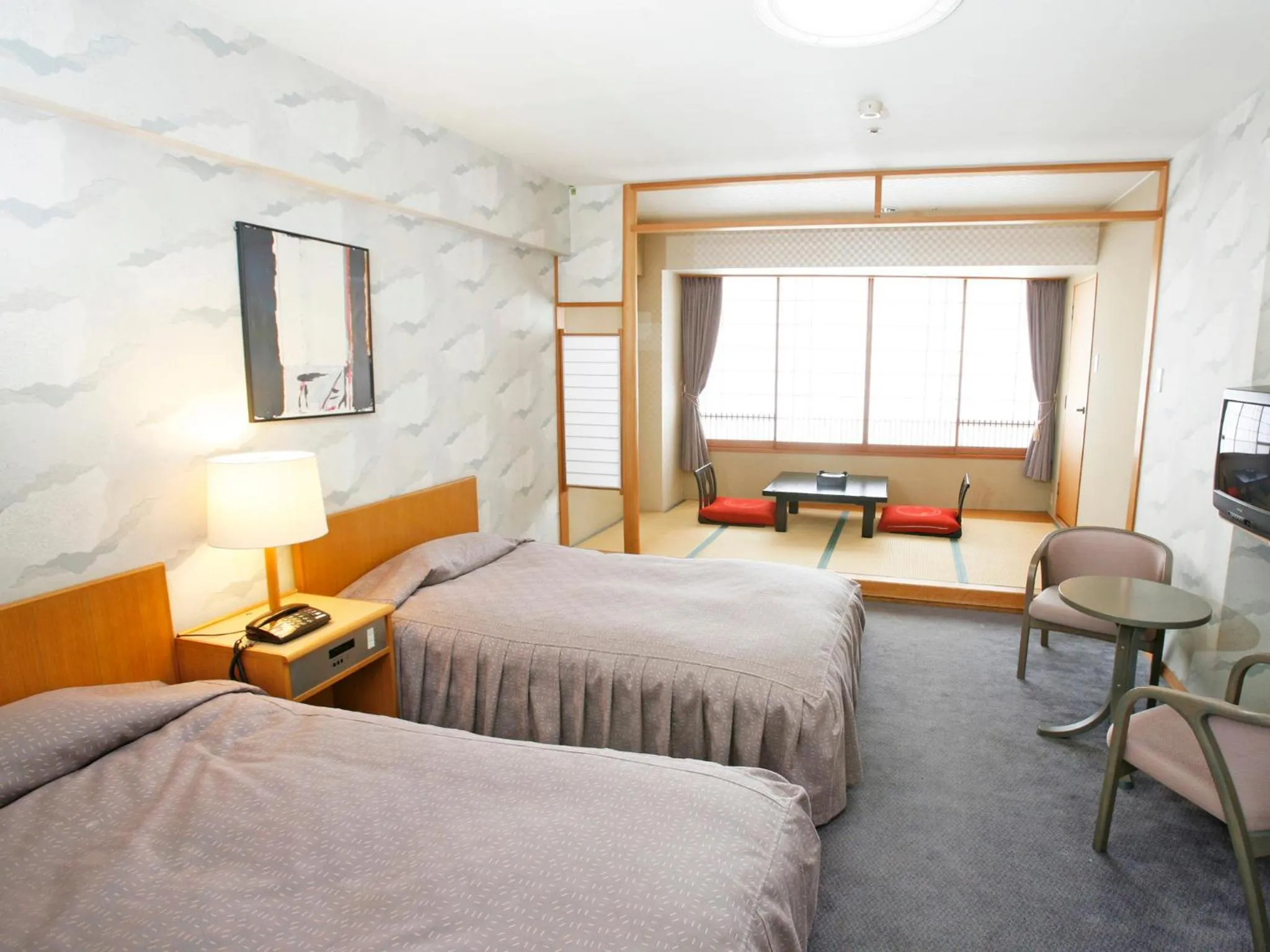 TV and multimedia, Bed in Hotel Ravie Kawaryo