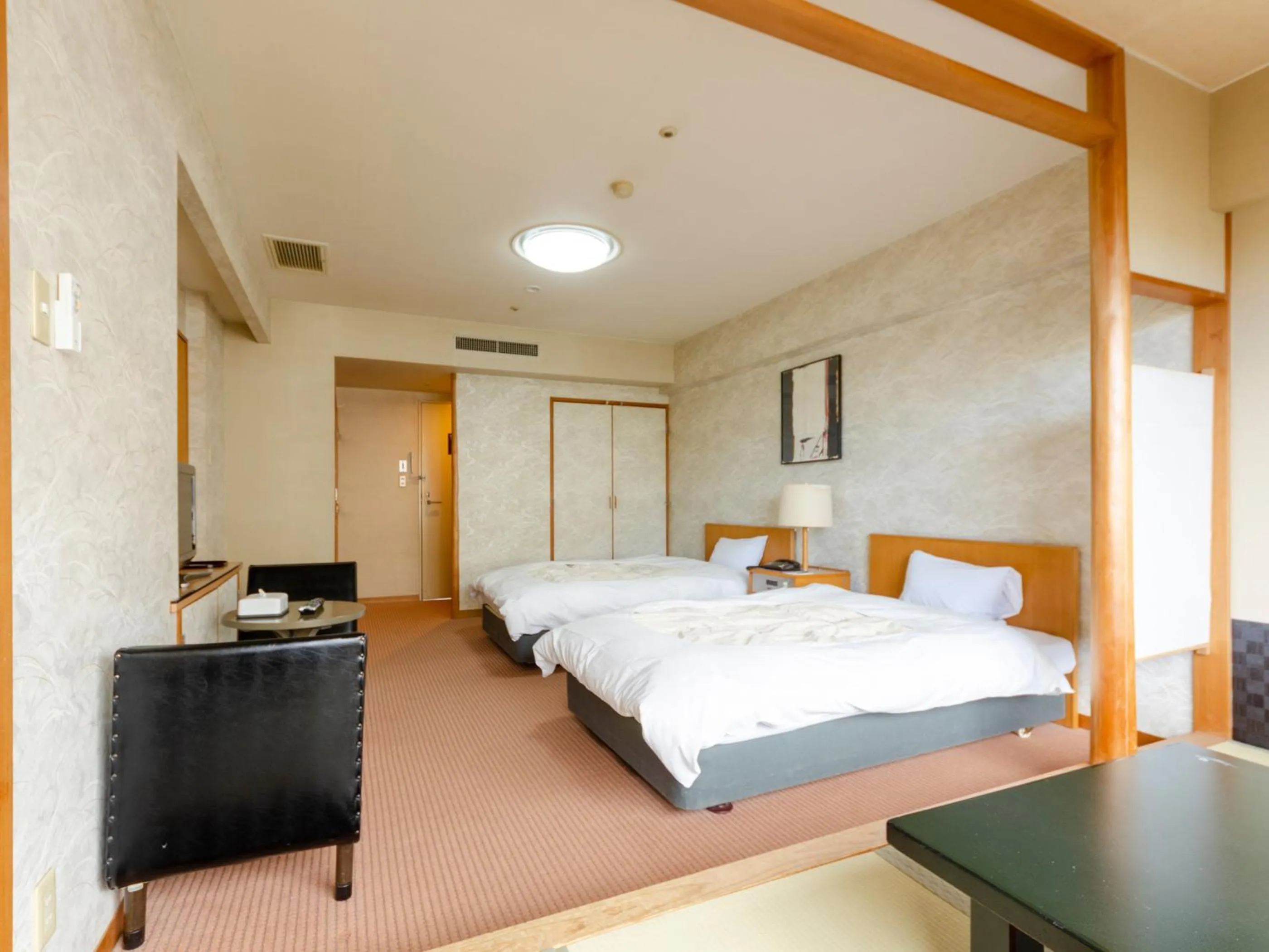 Photo of the whole room, Bed in Hotel Ravie Kawaryo