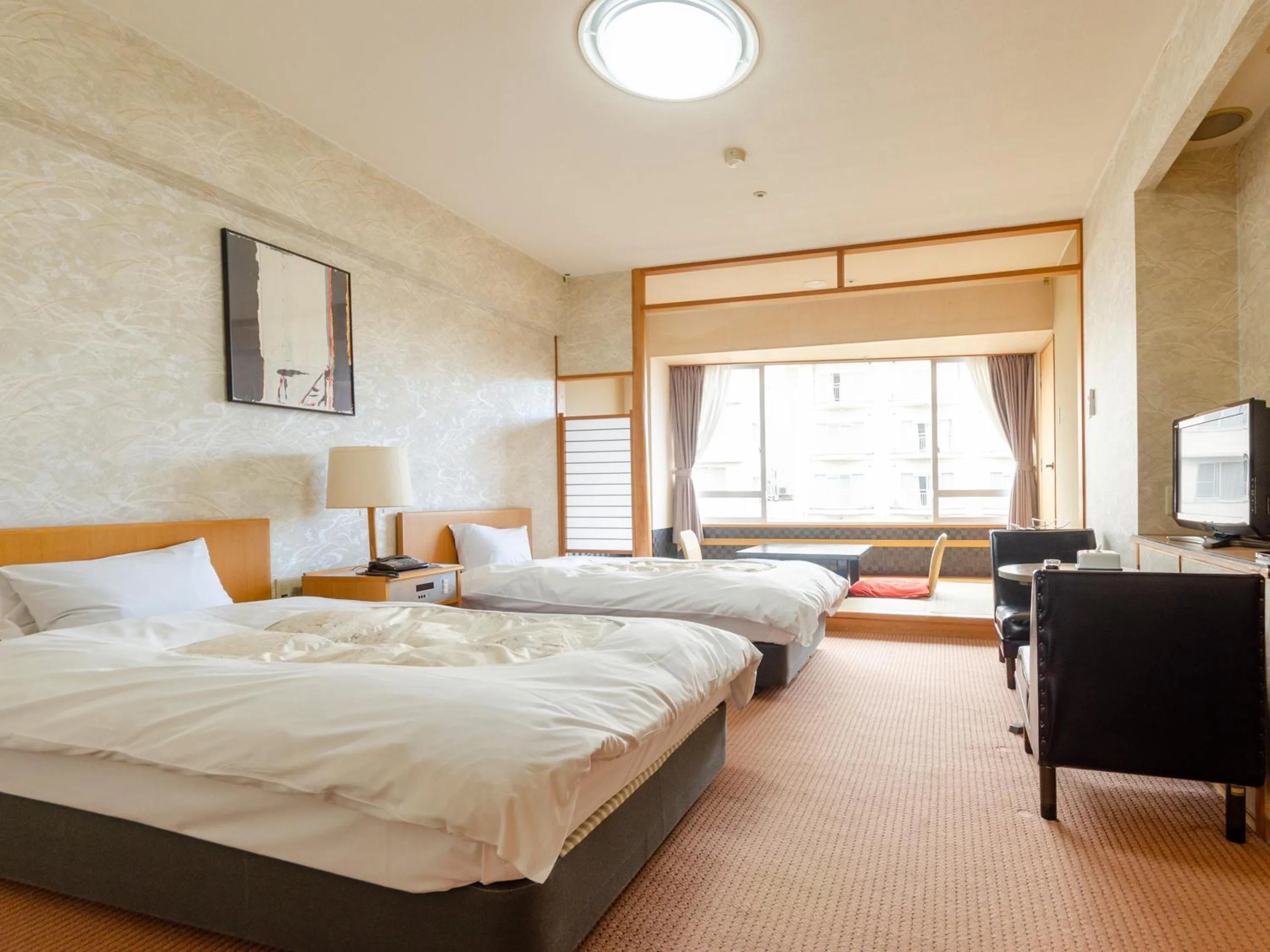 Photo of the whole room, Bed in Hotel Ravie Kawaryo