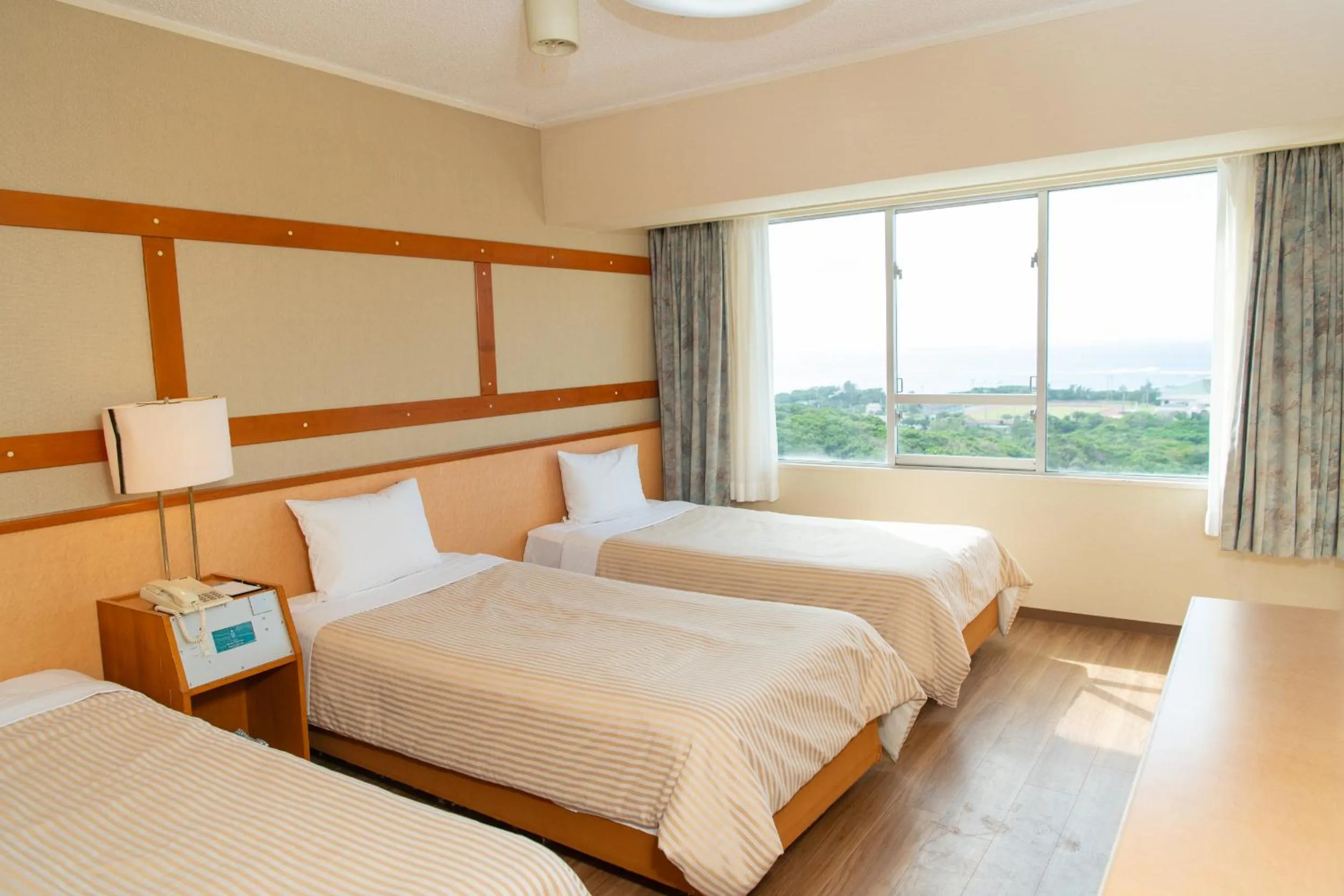Bed in Motobu Green Park and Golf Course