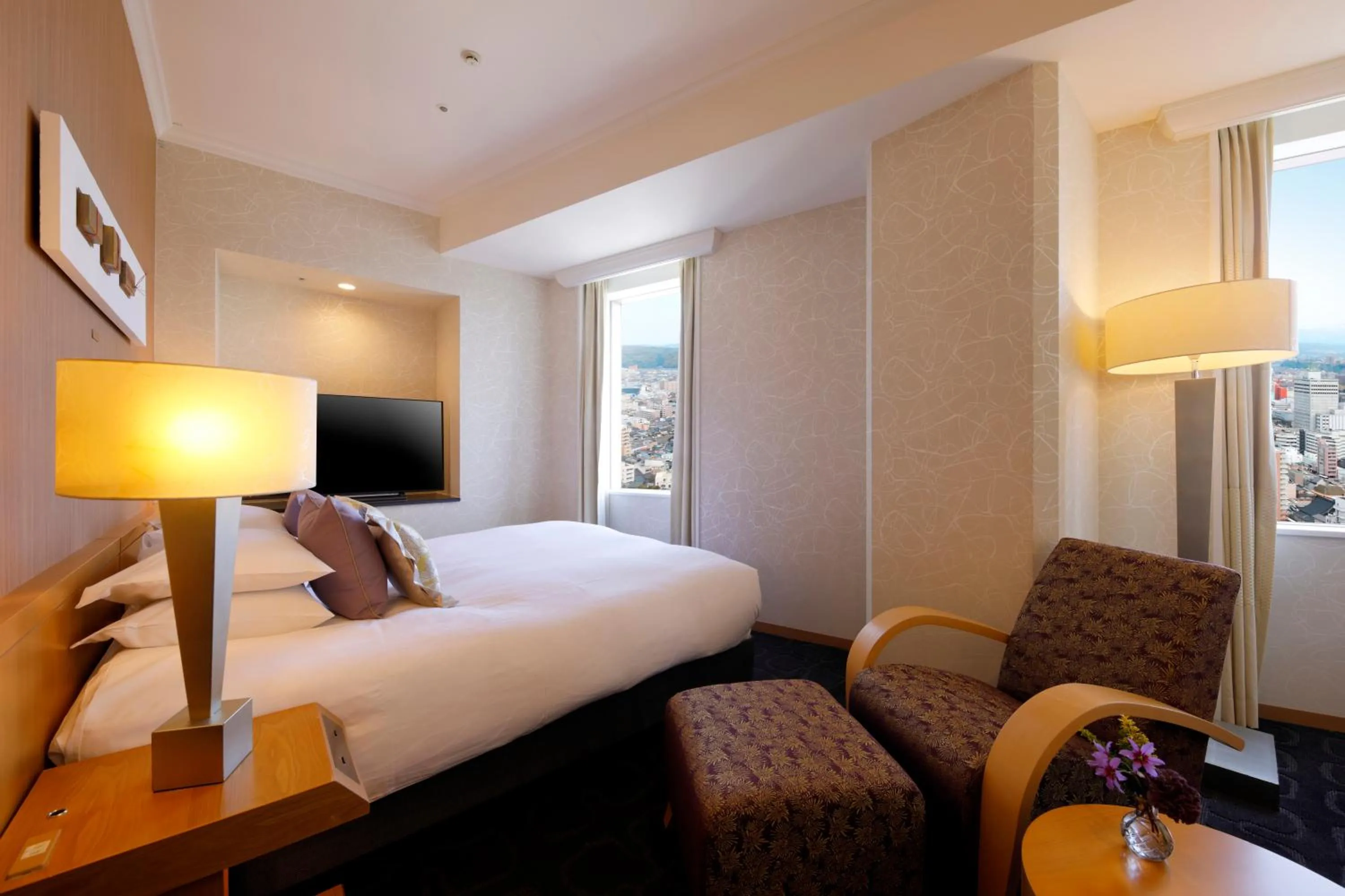 Photo of the whole room, Bed in Hotel Nikko Kanazawa