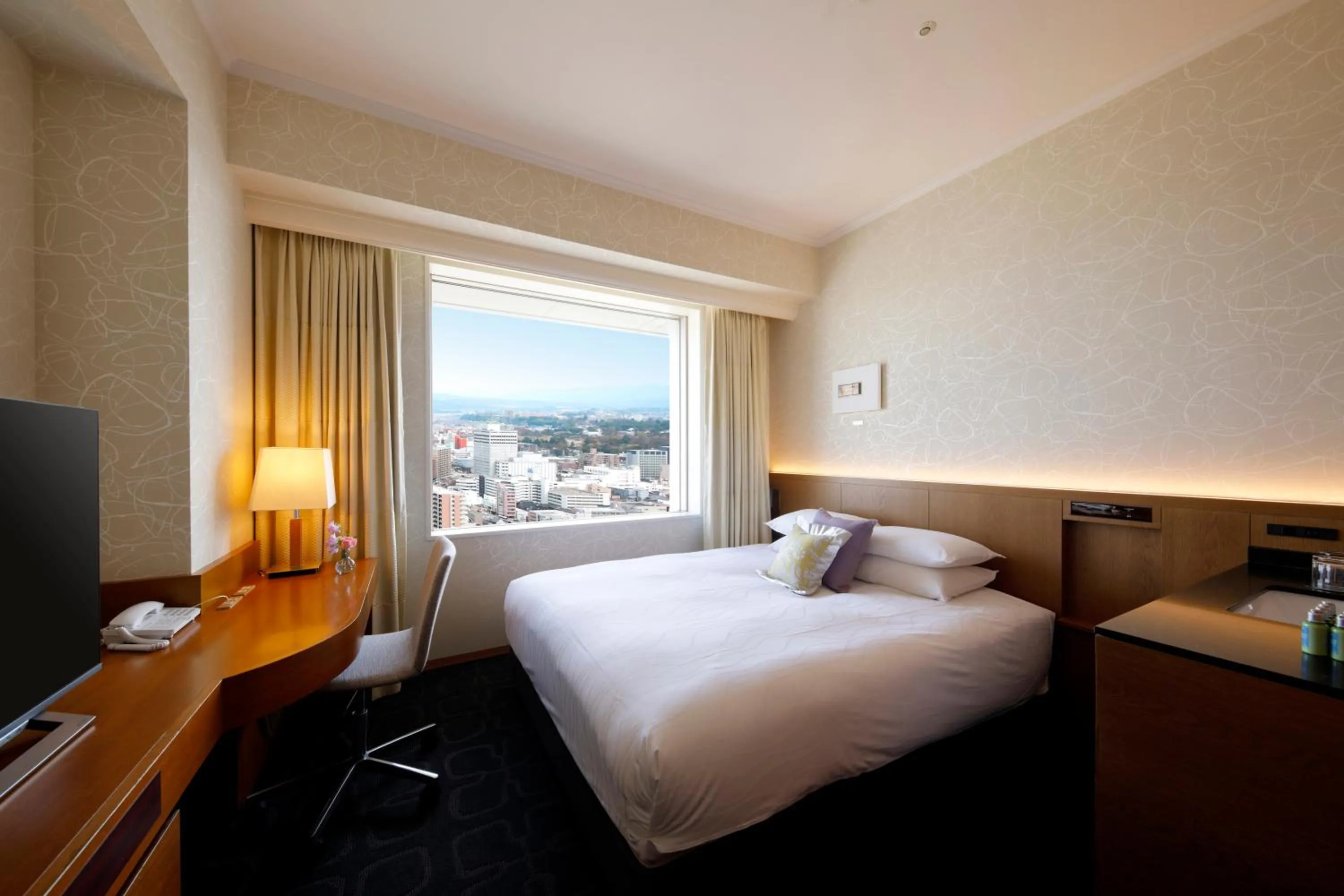 Bed in Hotel Nikko Kanazawa