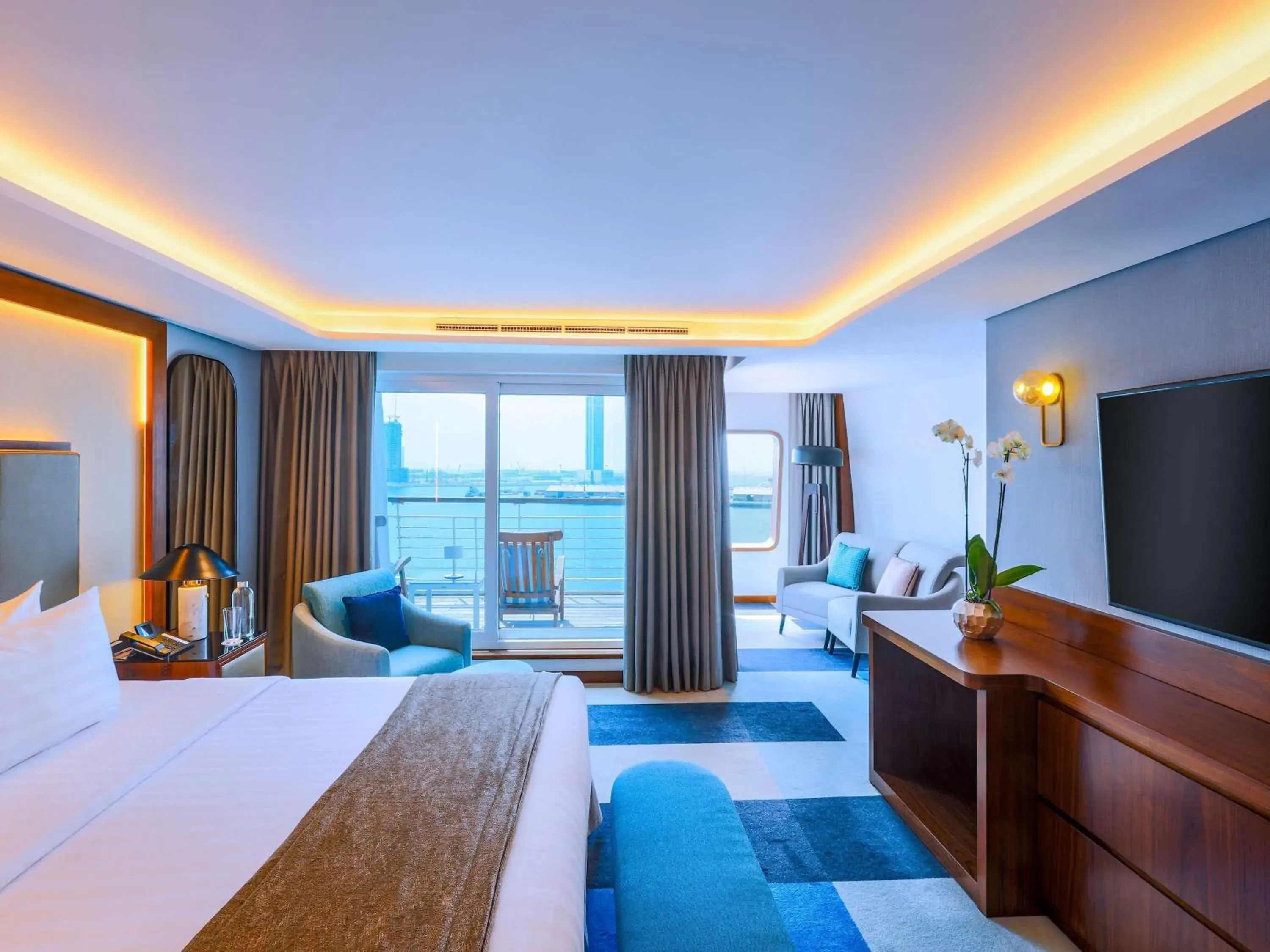 Duplex Suite with One King Bed and Separate Living Room Area in Queen Elizabeth 2 Hotel Duplex Suite with One King Bed and Separate Living Room Area in Queen Elizabeth 2 Hotel