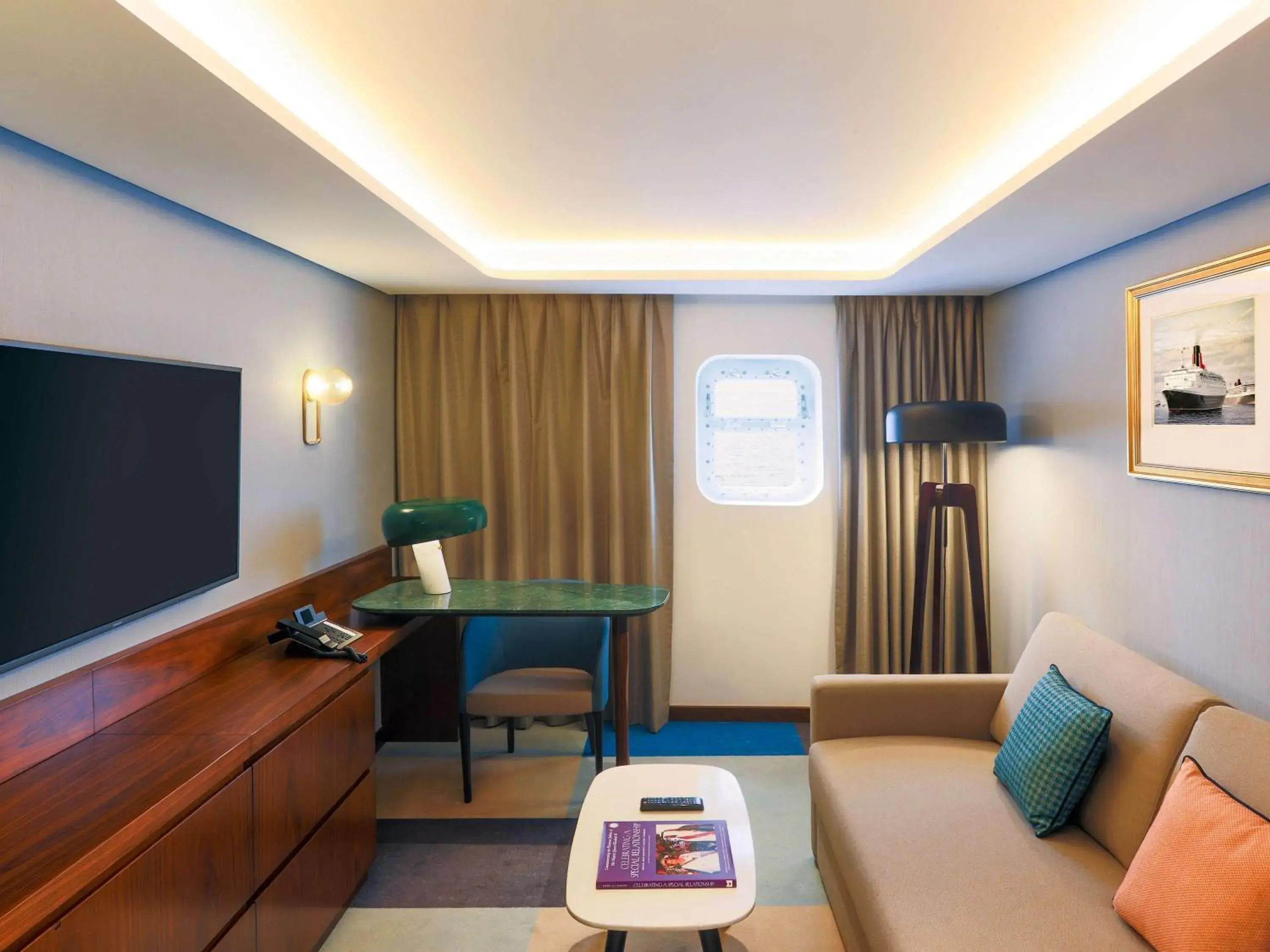 Officer Suite with One King Bed and Sofa Bed in Queen Elizabeth 2 Hotel Officer Suite with One King Bed and Sofa Bed in Queen Elizabeth 2 Hotel