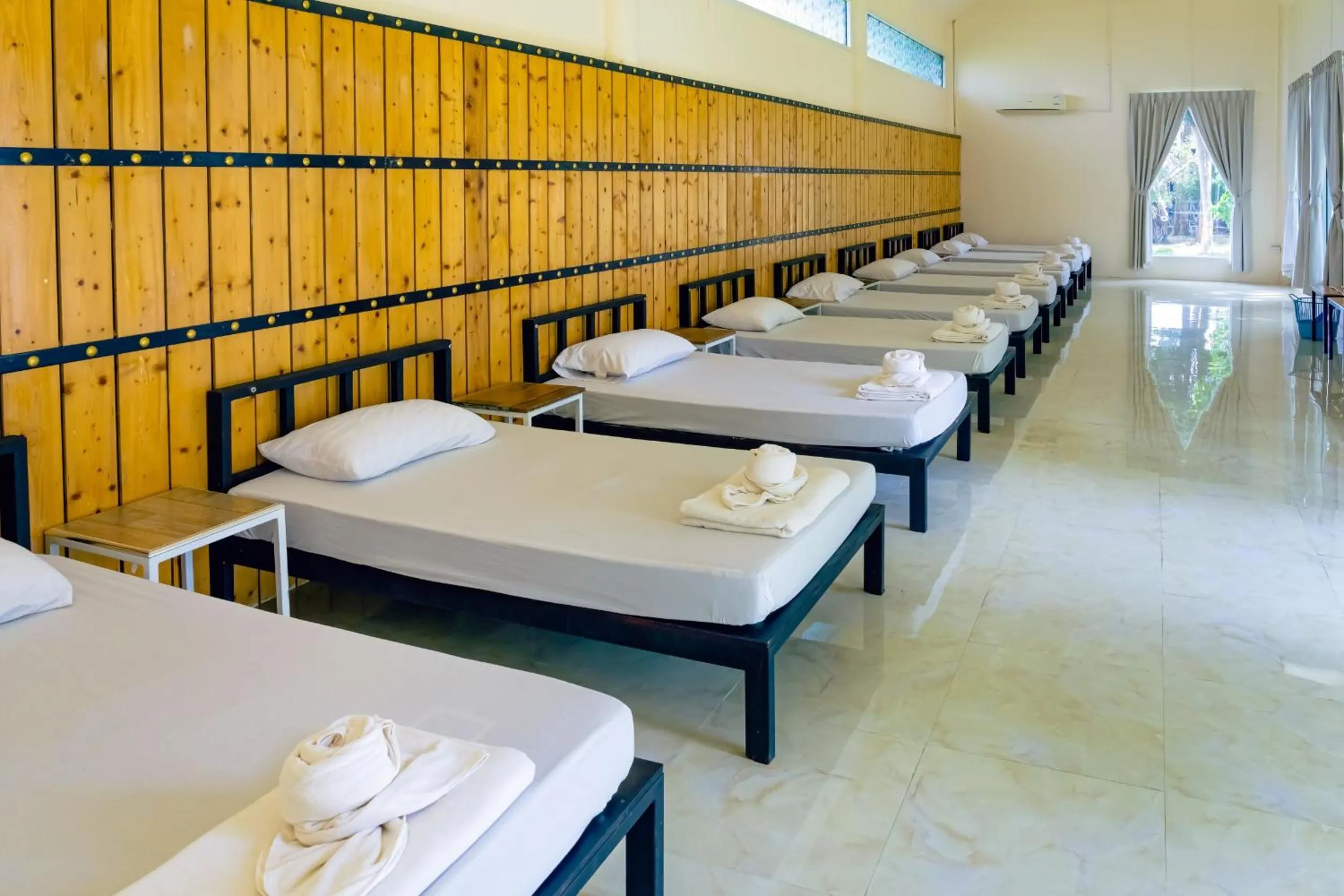 Bed in Yoko River Kwai Resort