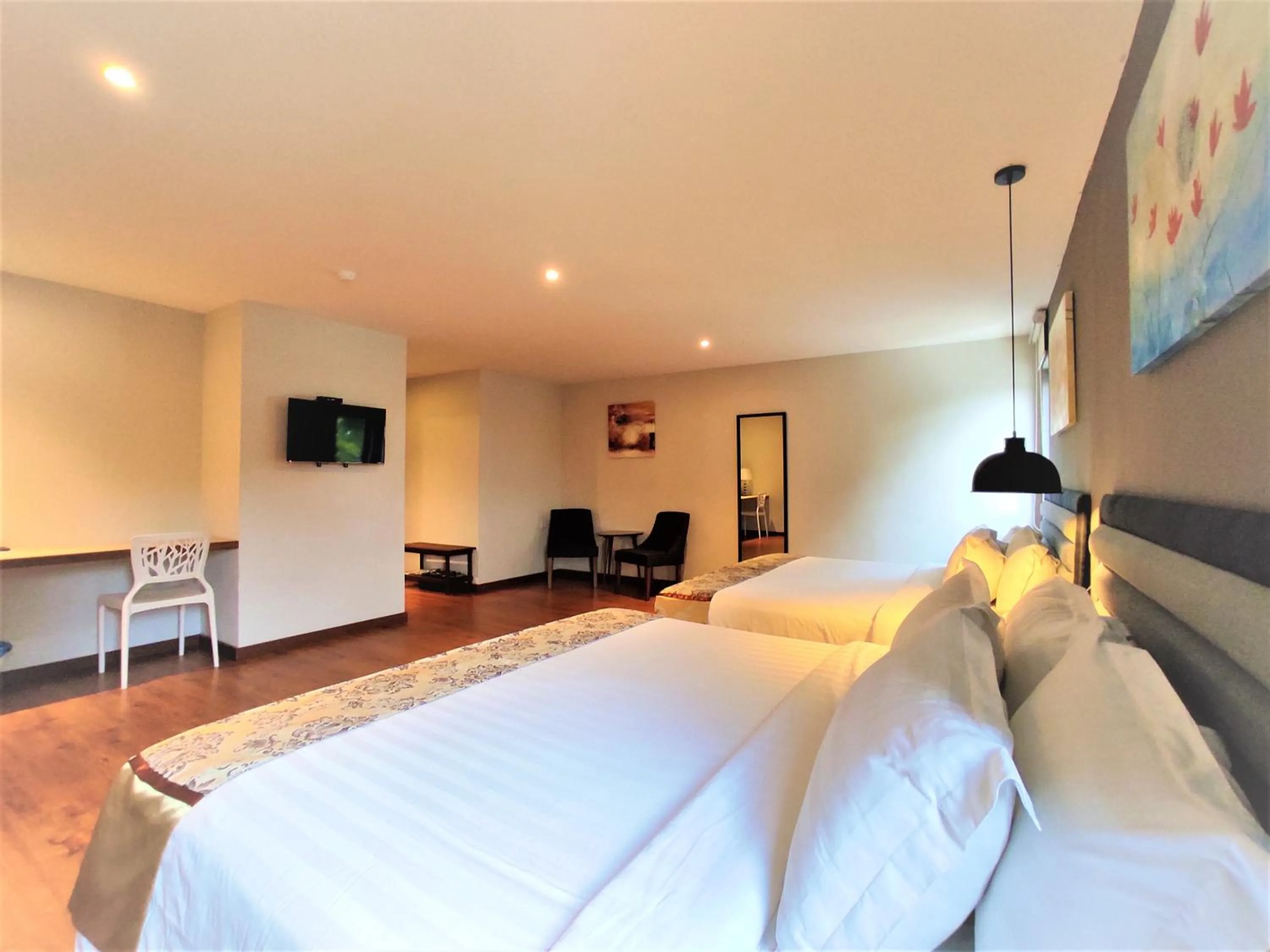 Photo of the whole room, Bed in Apple Suites Hotel