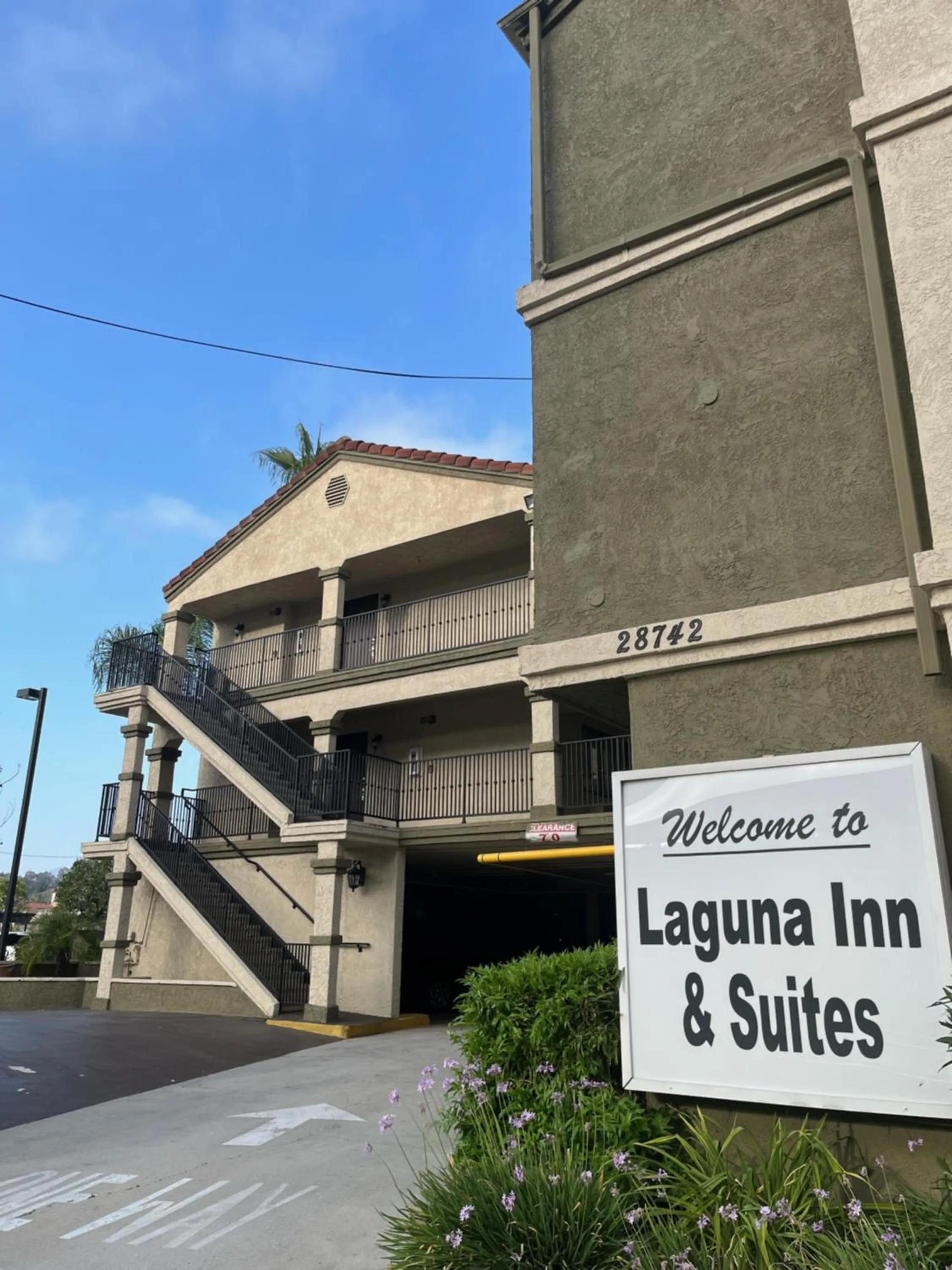 Property logo or sign in Laguna Inn and Suites