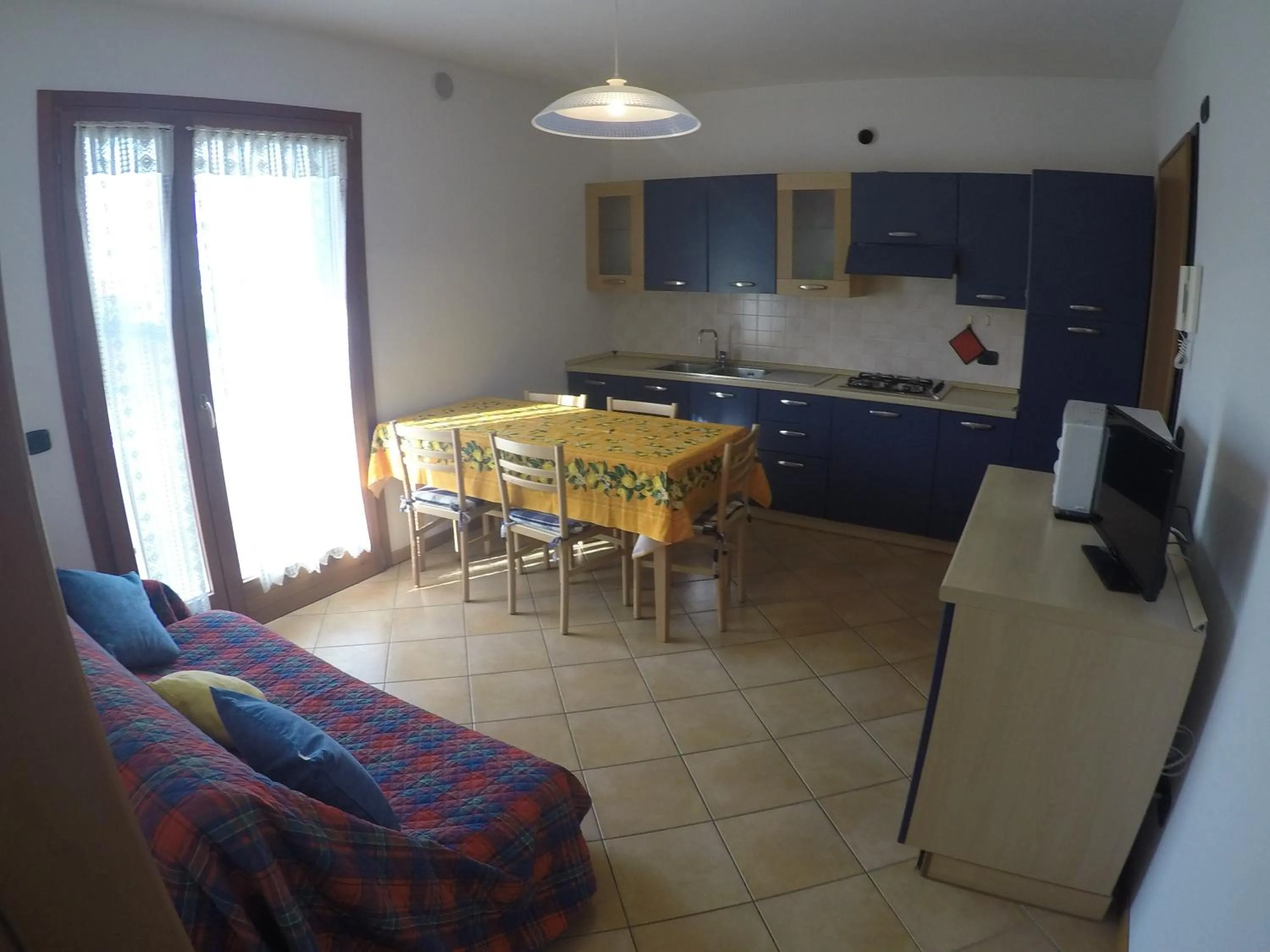 Kitchen or kitchenette in Residence Marina Blu - Agenzia Cocal