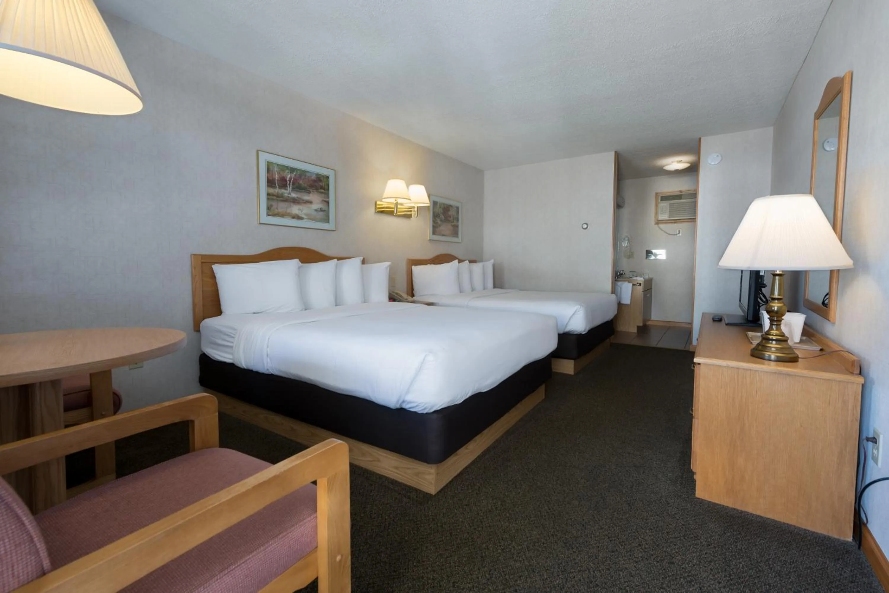 Bed in Americas Best Value Inn & Suites Lake George