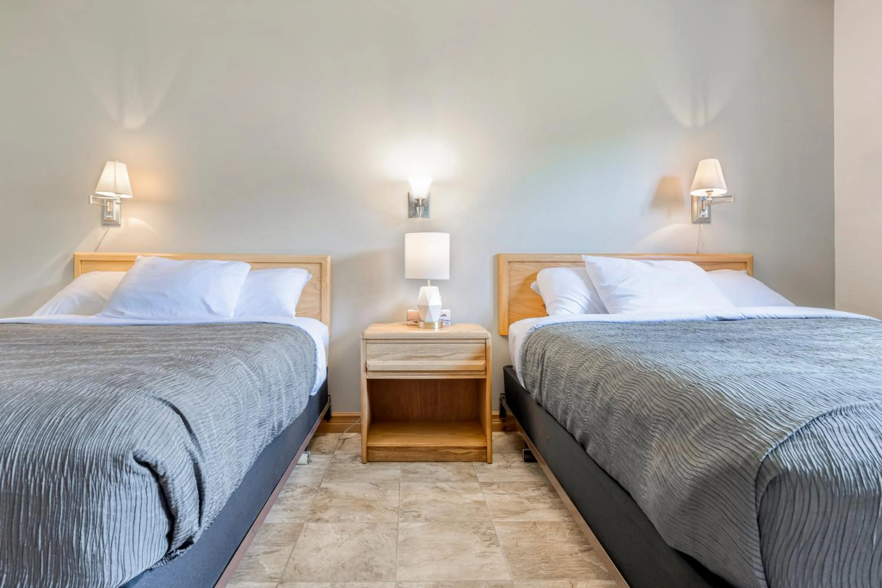 Bed in Homeport Motel