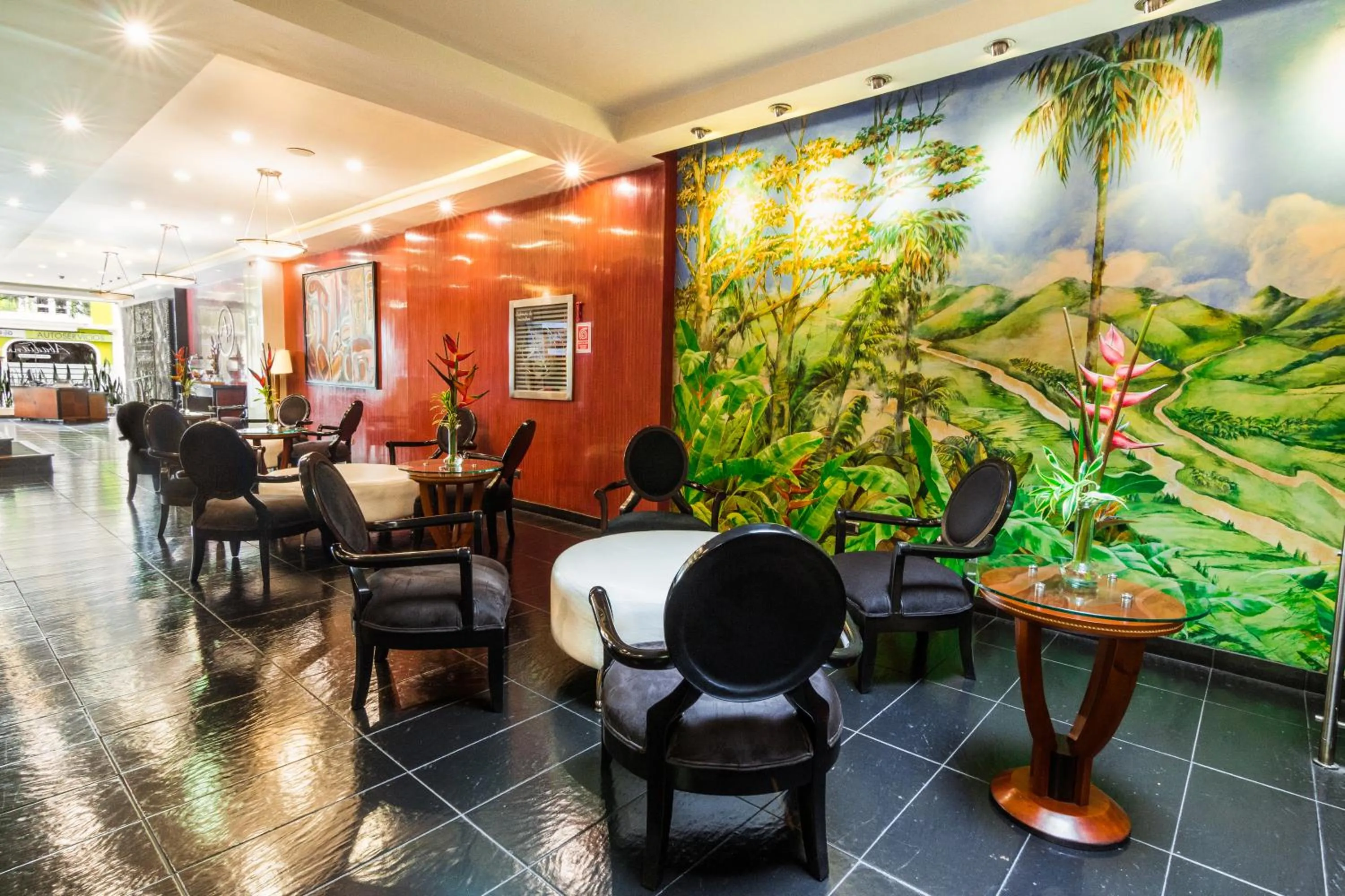 Seating area in GHL Hotel Abadia Plaza