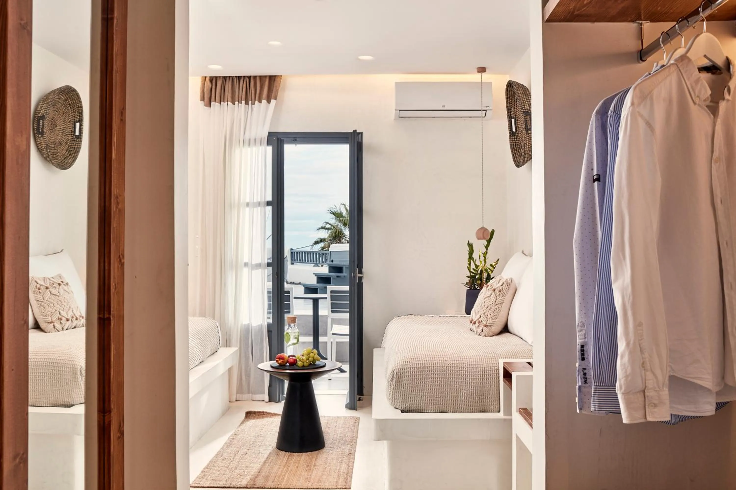 Seating area, Bed in Parian Boutique Hotel