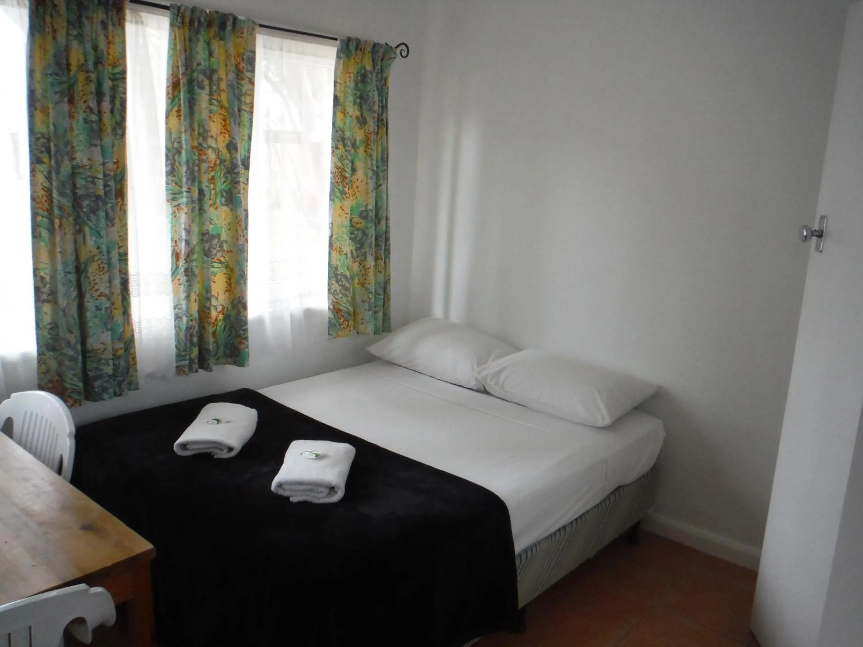 Bed in Restawile Motel